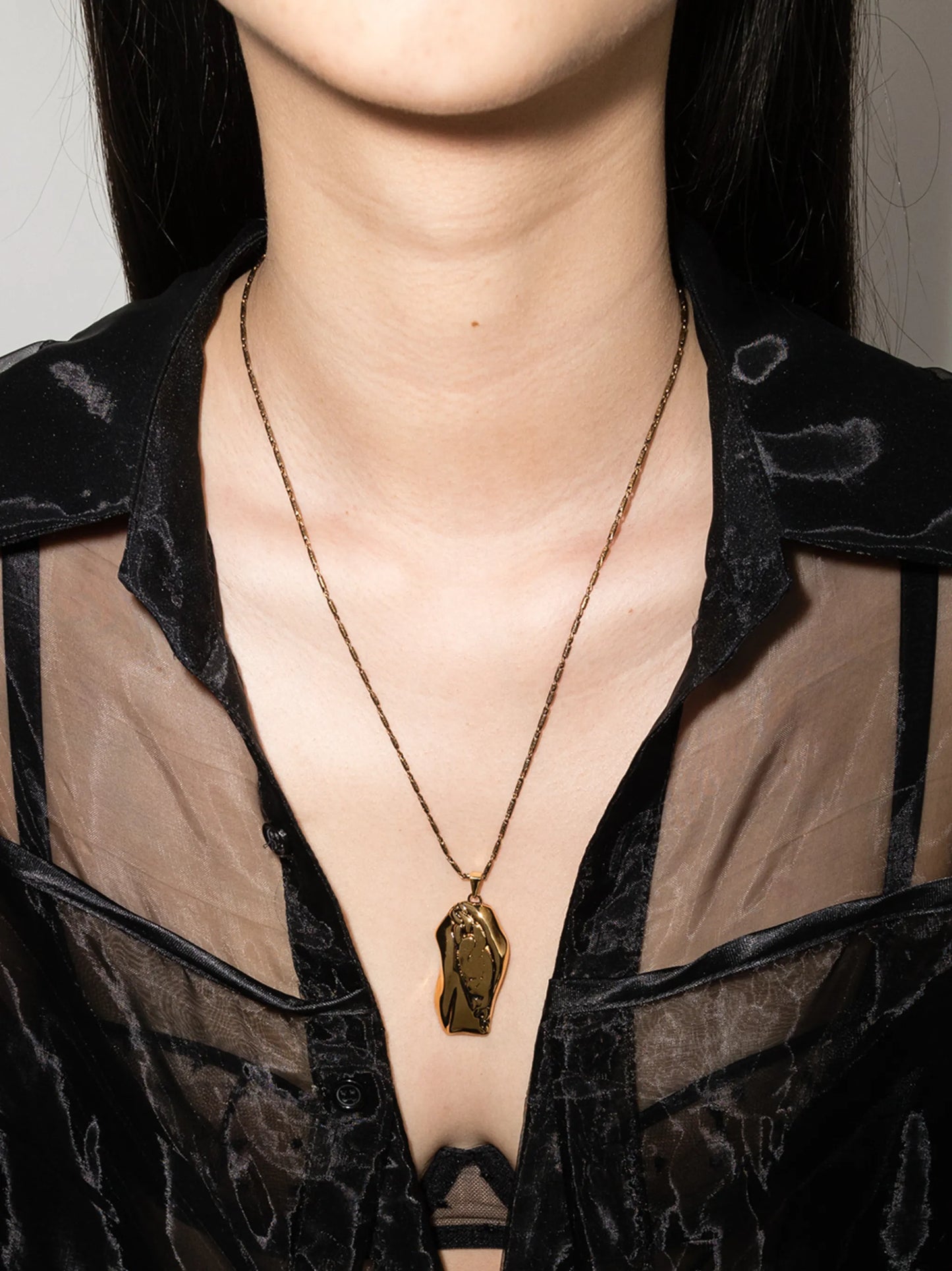 Molten pendant necklace