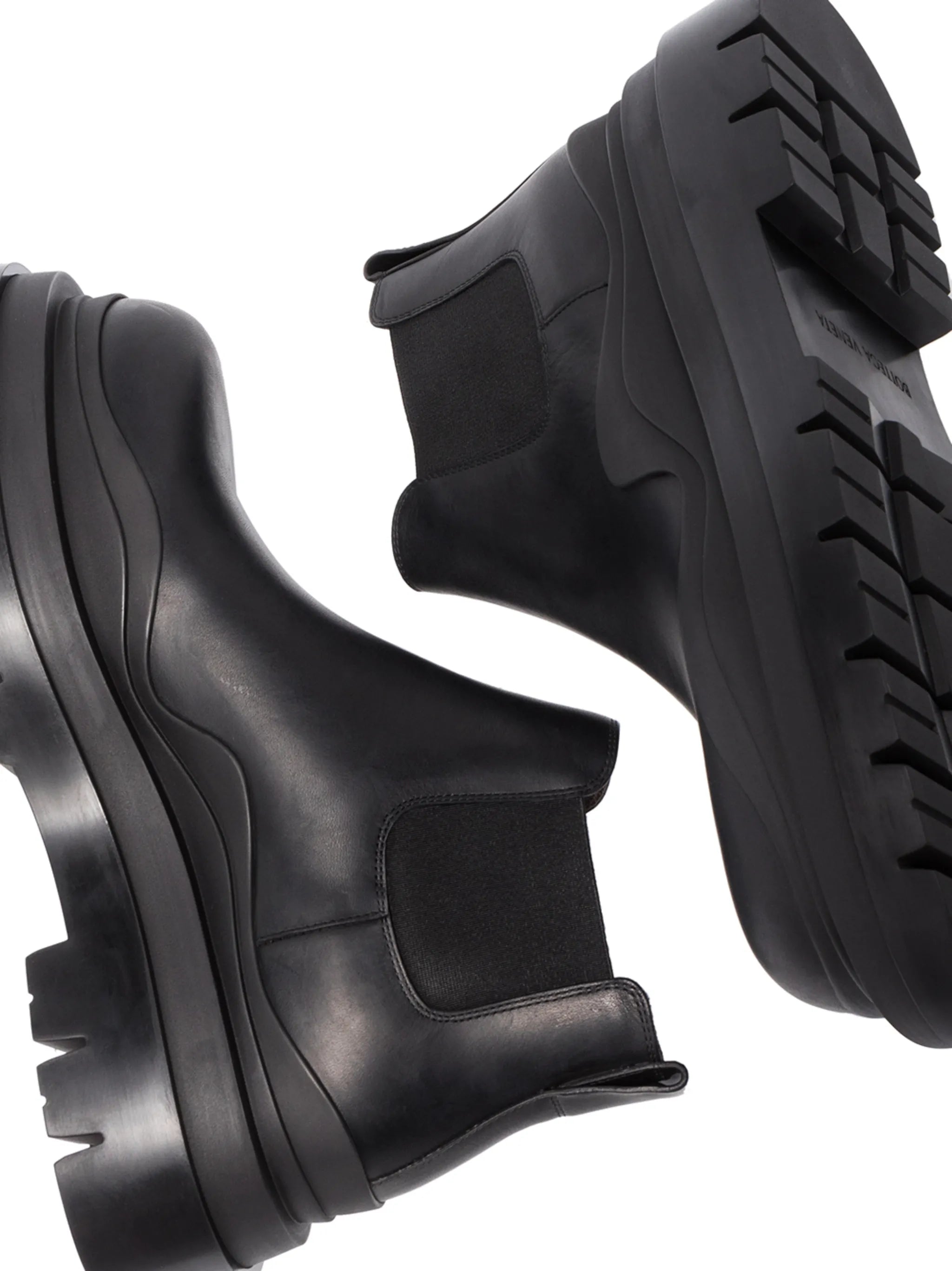 Tire leather ankle boots