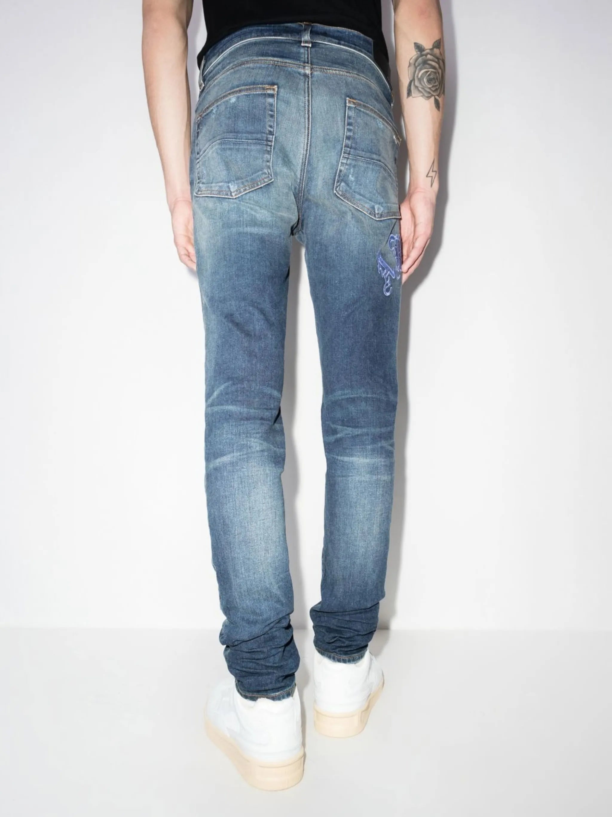 Old English logo skinny jeans