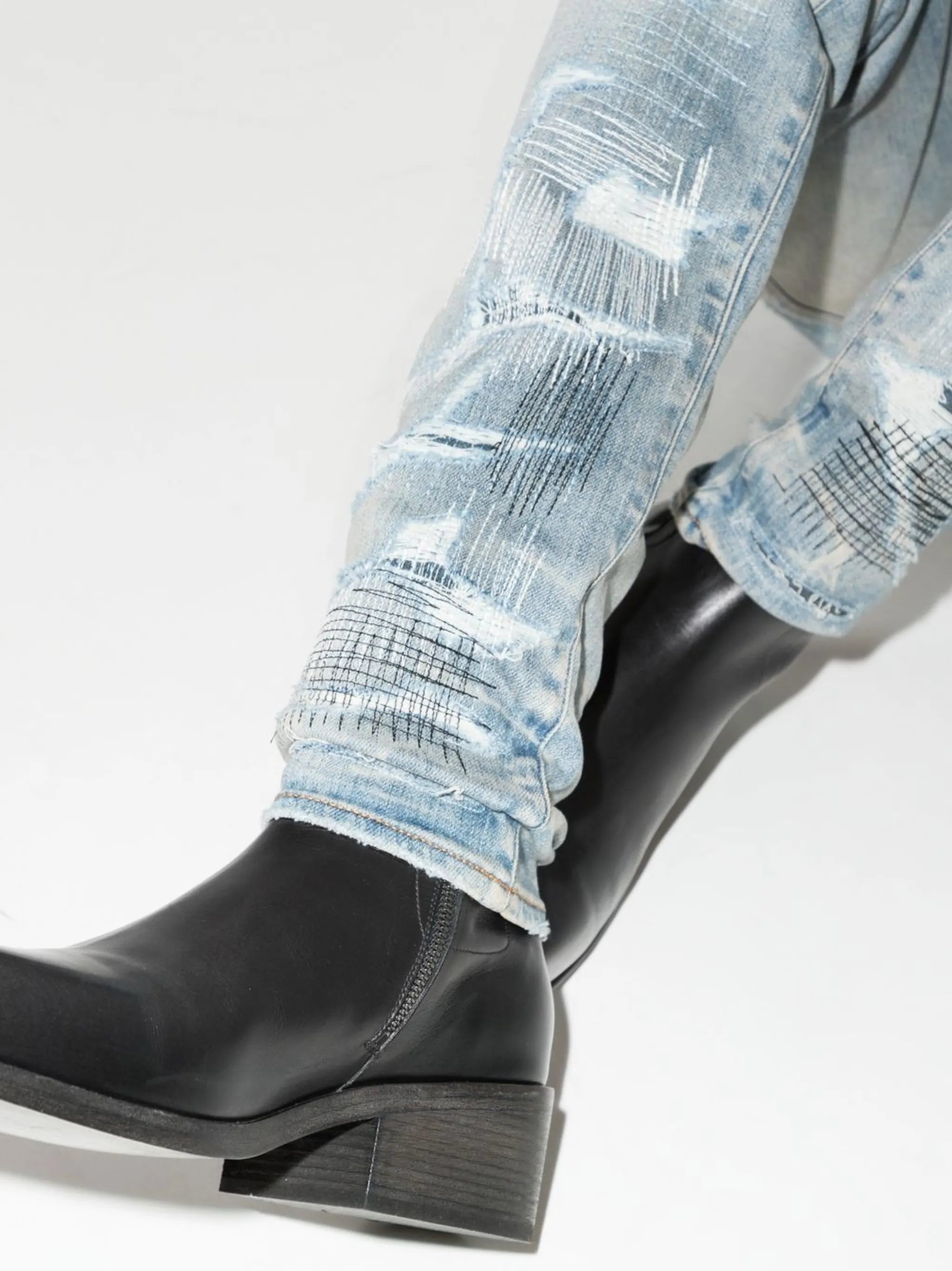 distressed-finish skinny jeans