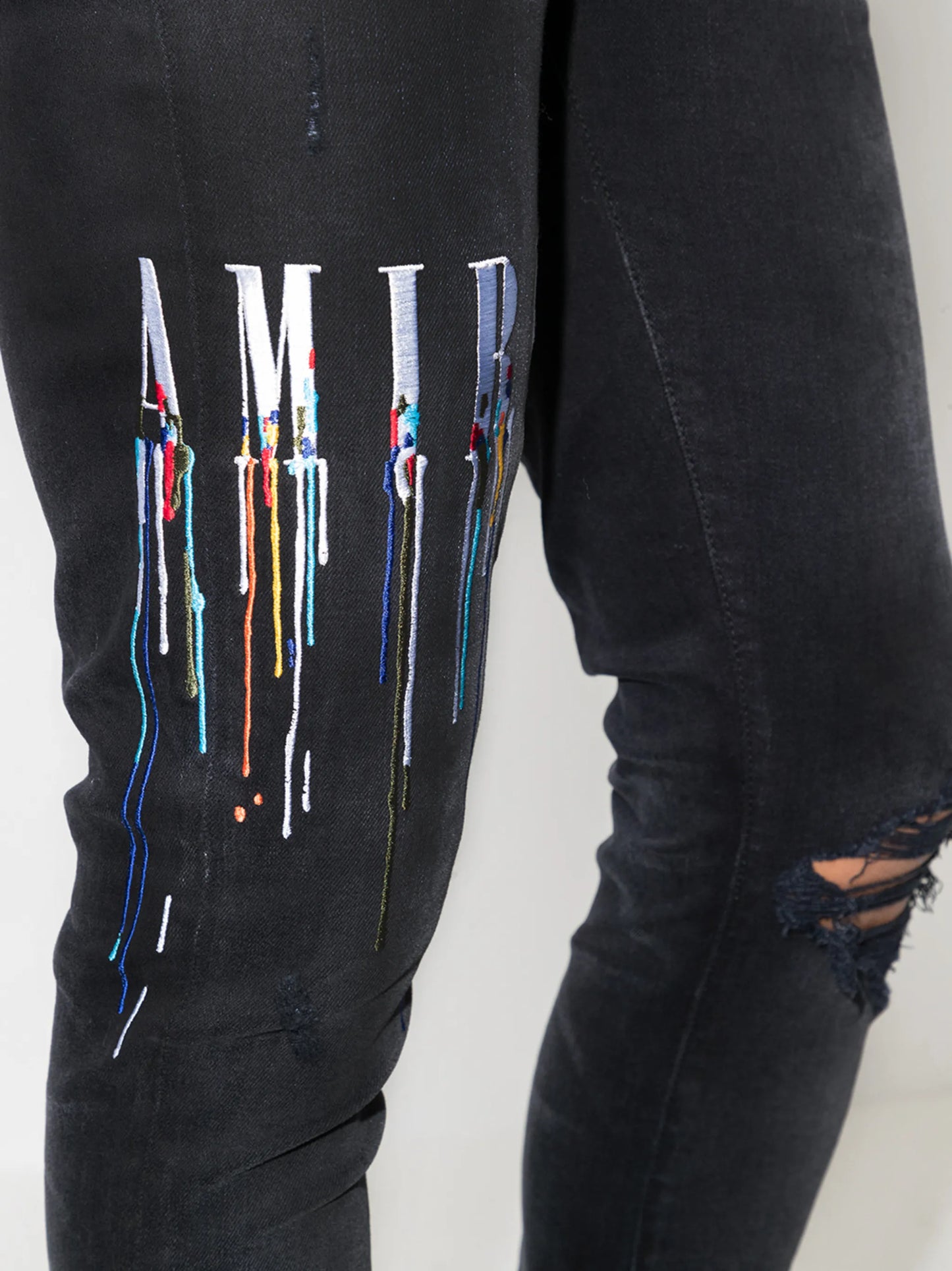 logo-embroidered skinny jeans