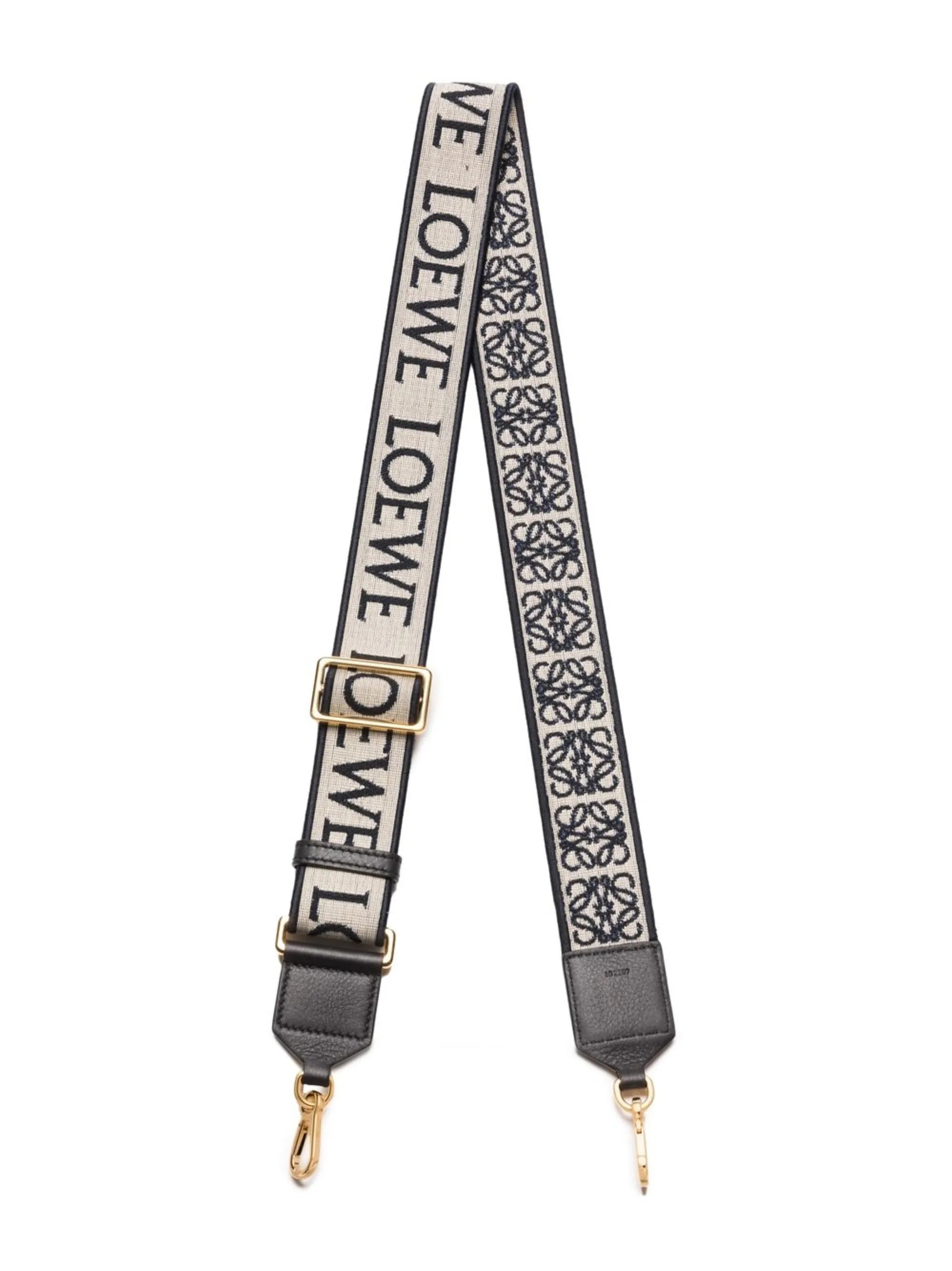 Anagram reversible bag strap