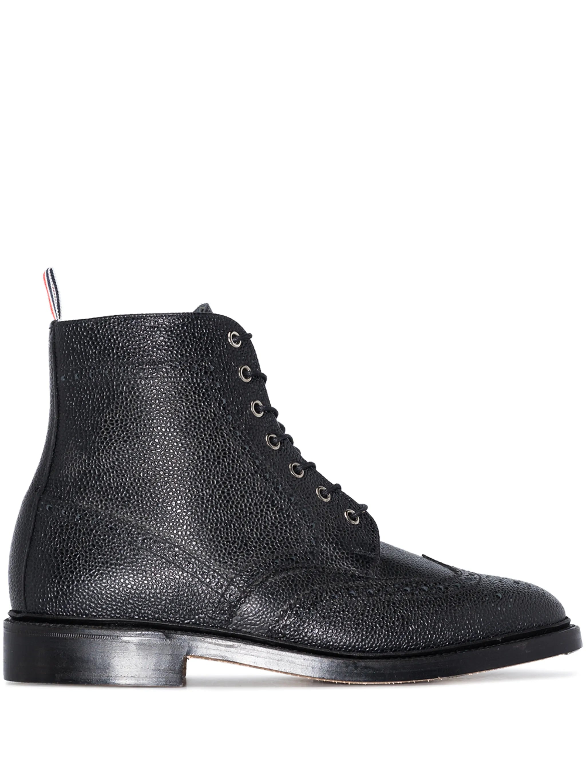 pebble grain leather wingtip boots with metal taps