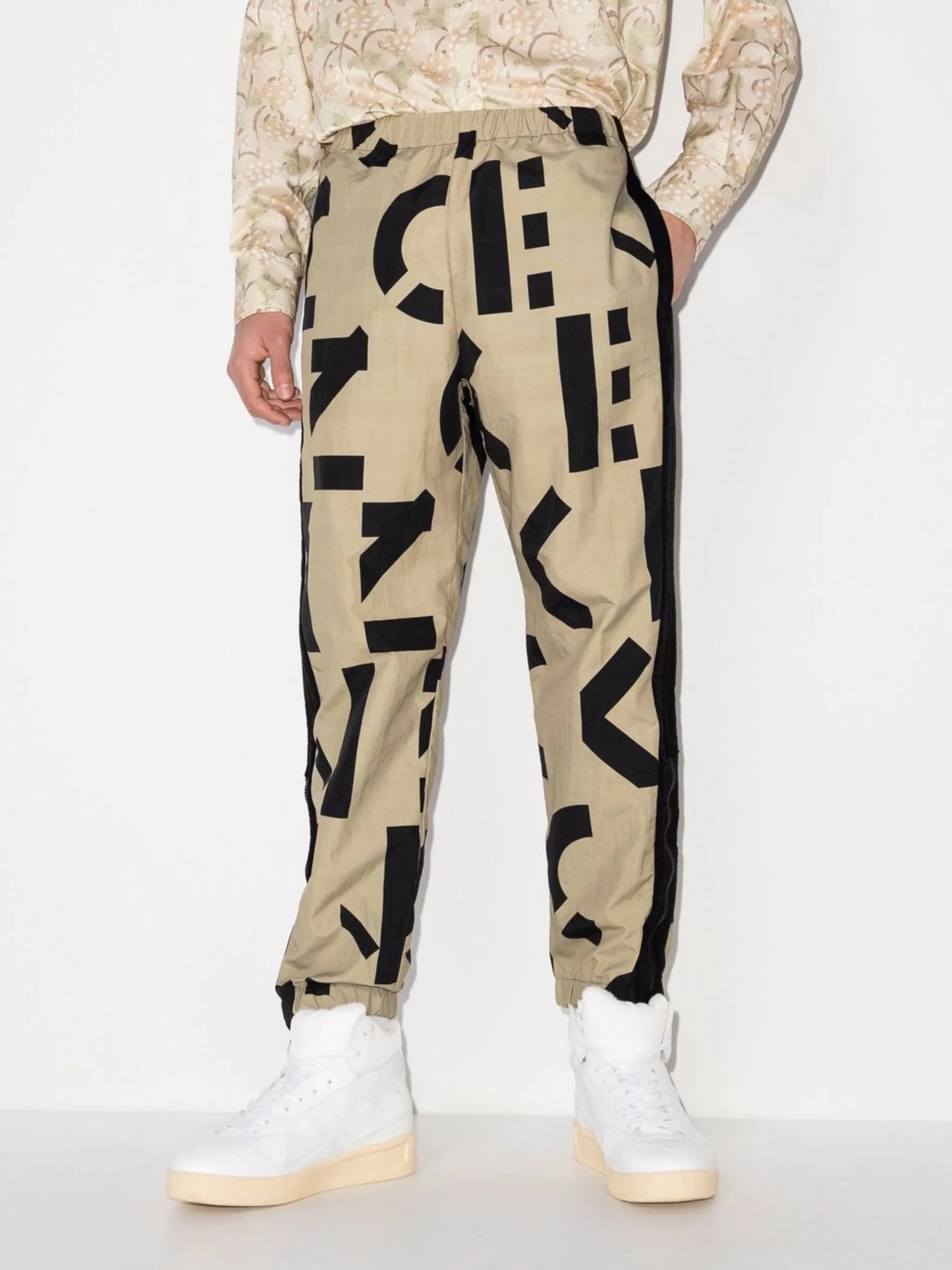monogram-print elasticated trousers