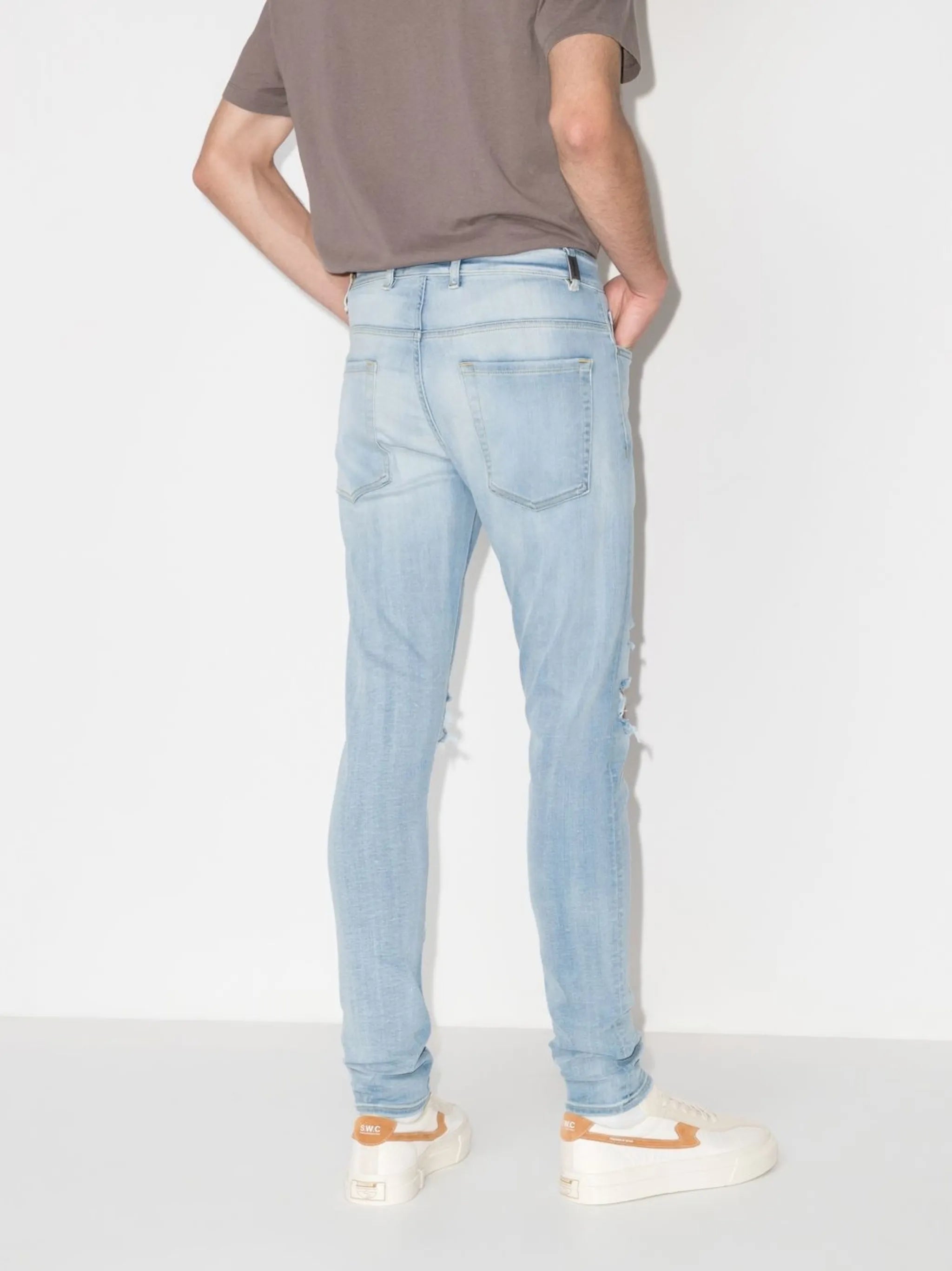 distressed-effect skinny jeans