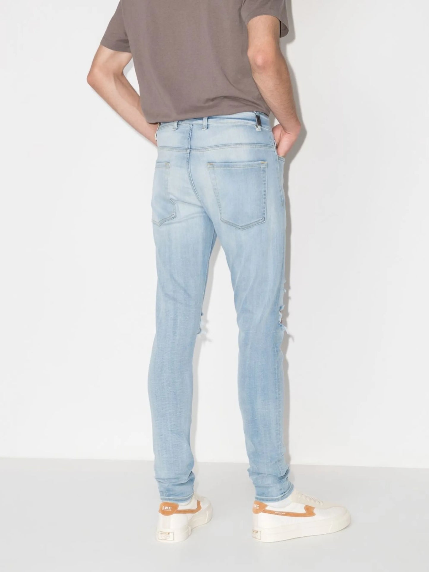distressed-effect skinny jeans