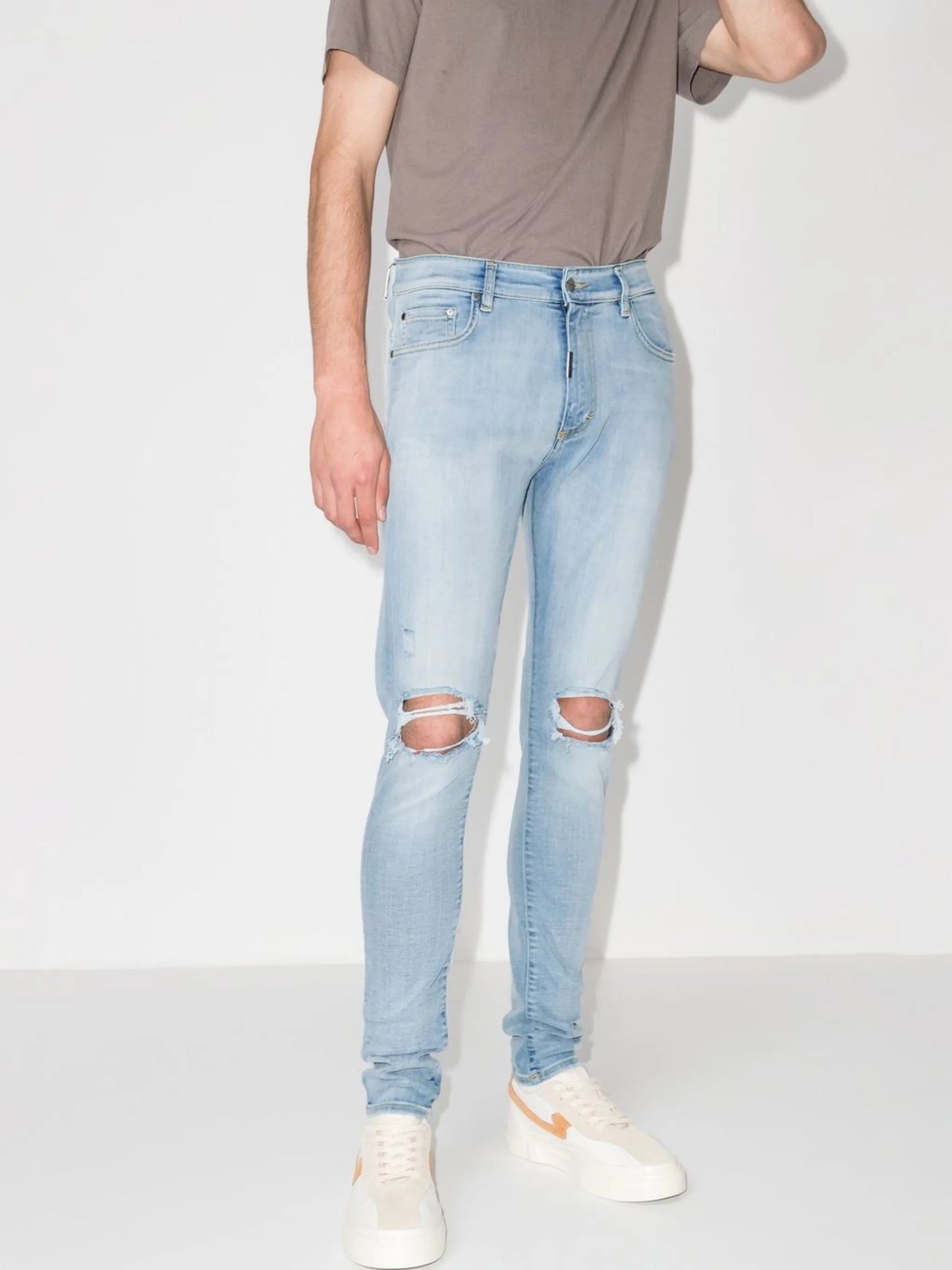 distressed-effect skinny jeans