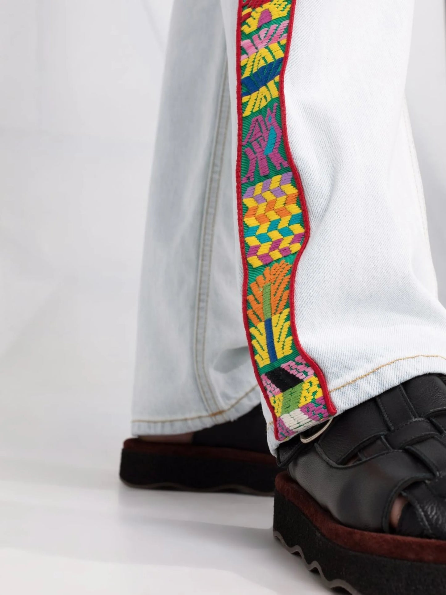 embroidered-trim straight-leg jeans