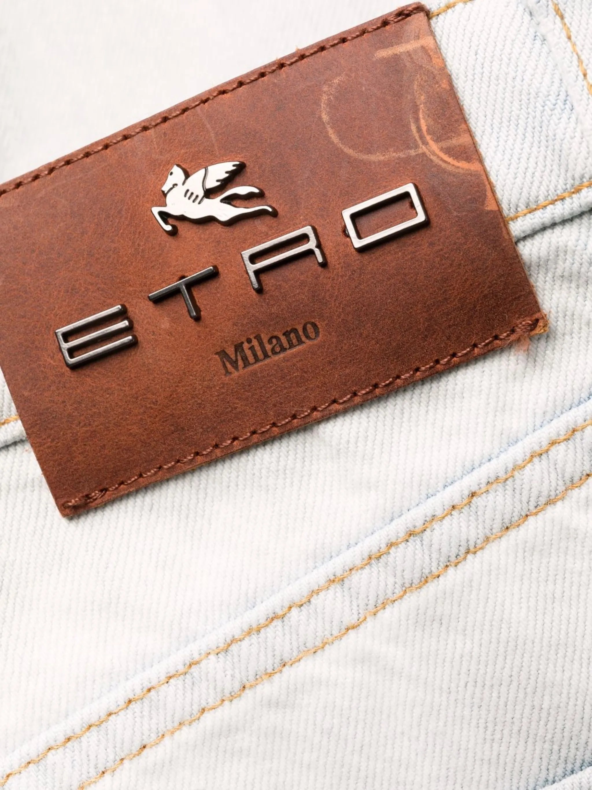 embroidered-trim straight-leg jeans