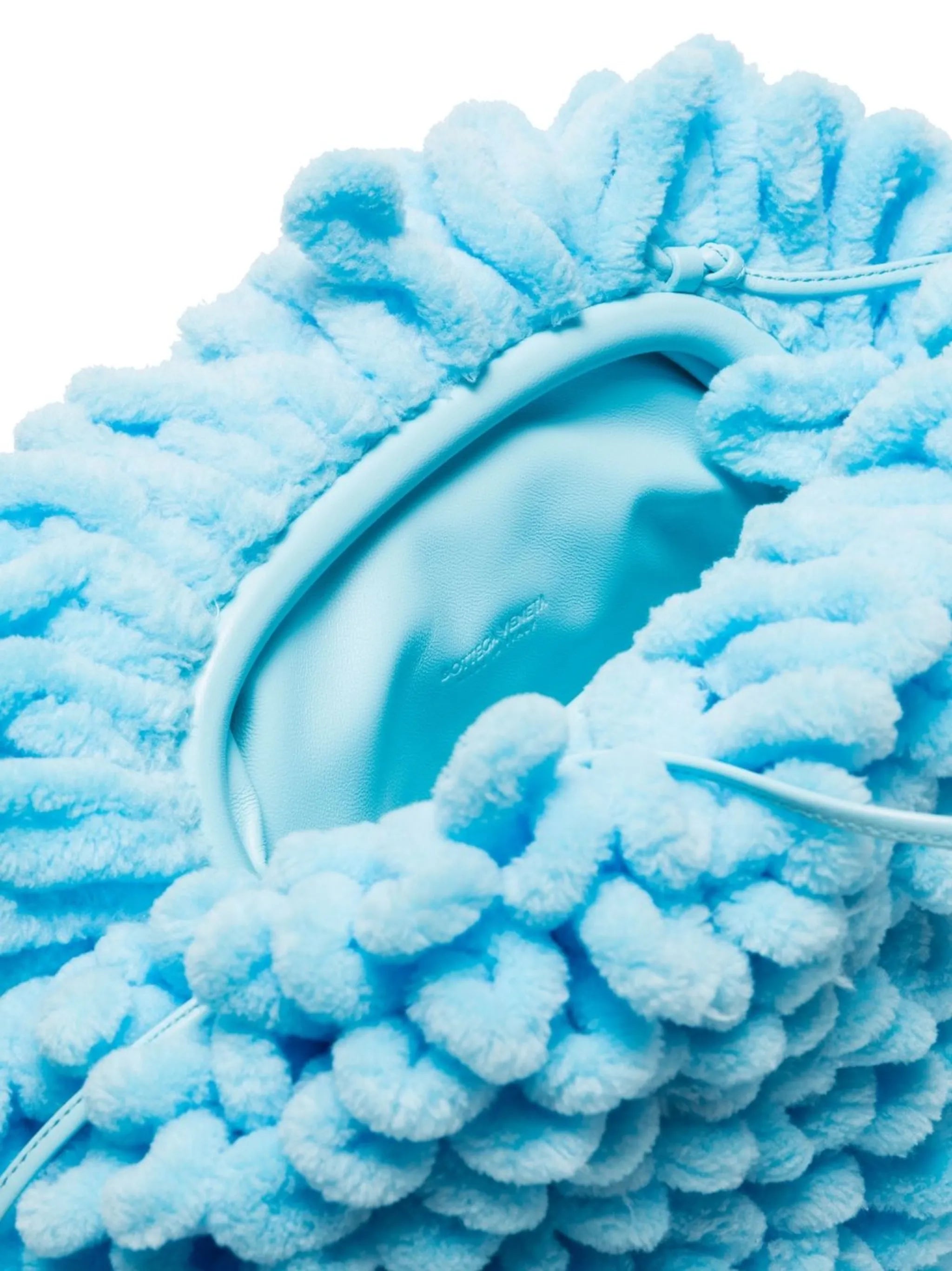 mop-effect clutch bag