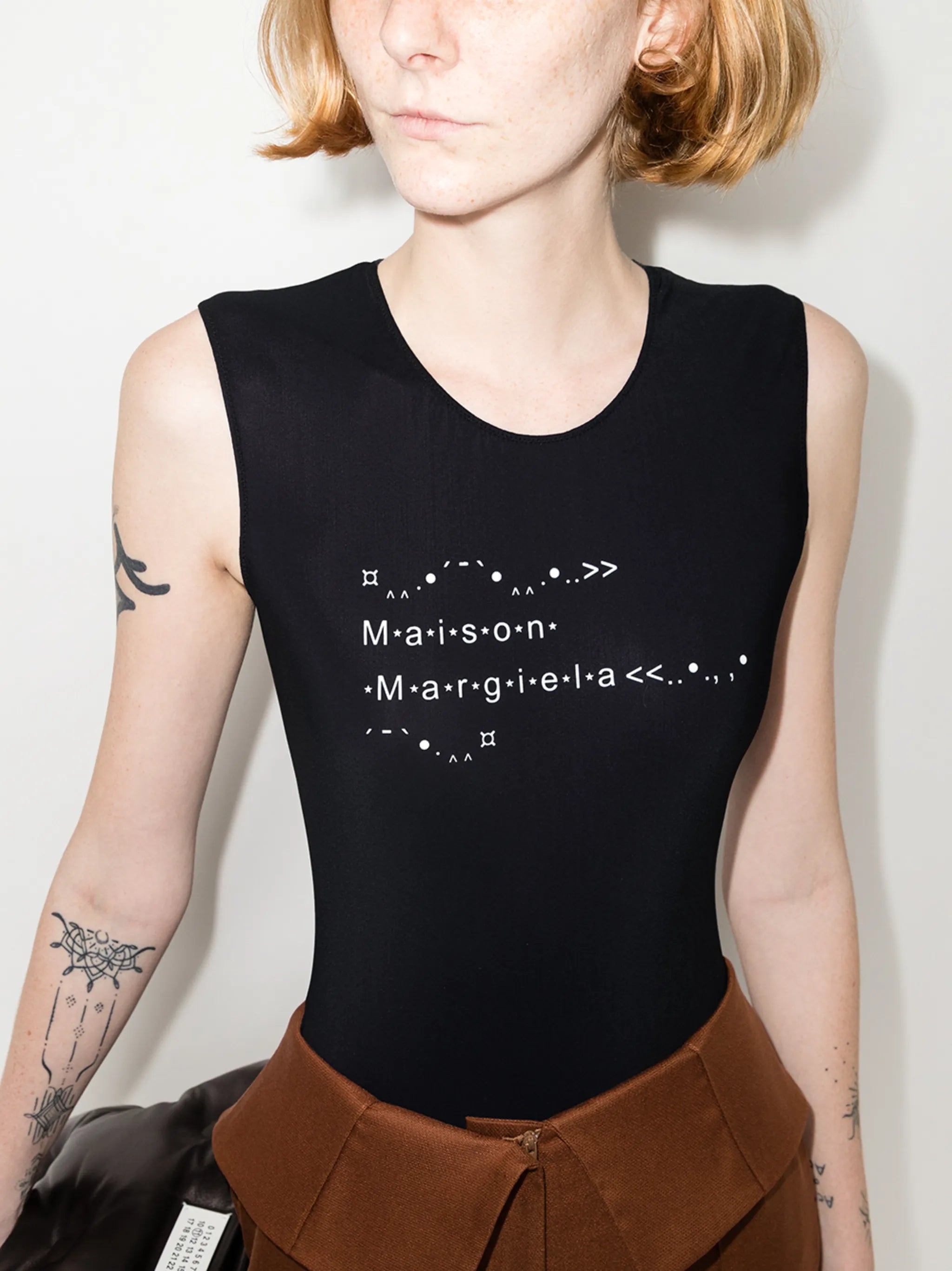 four-stitch logo bodysuit