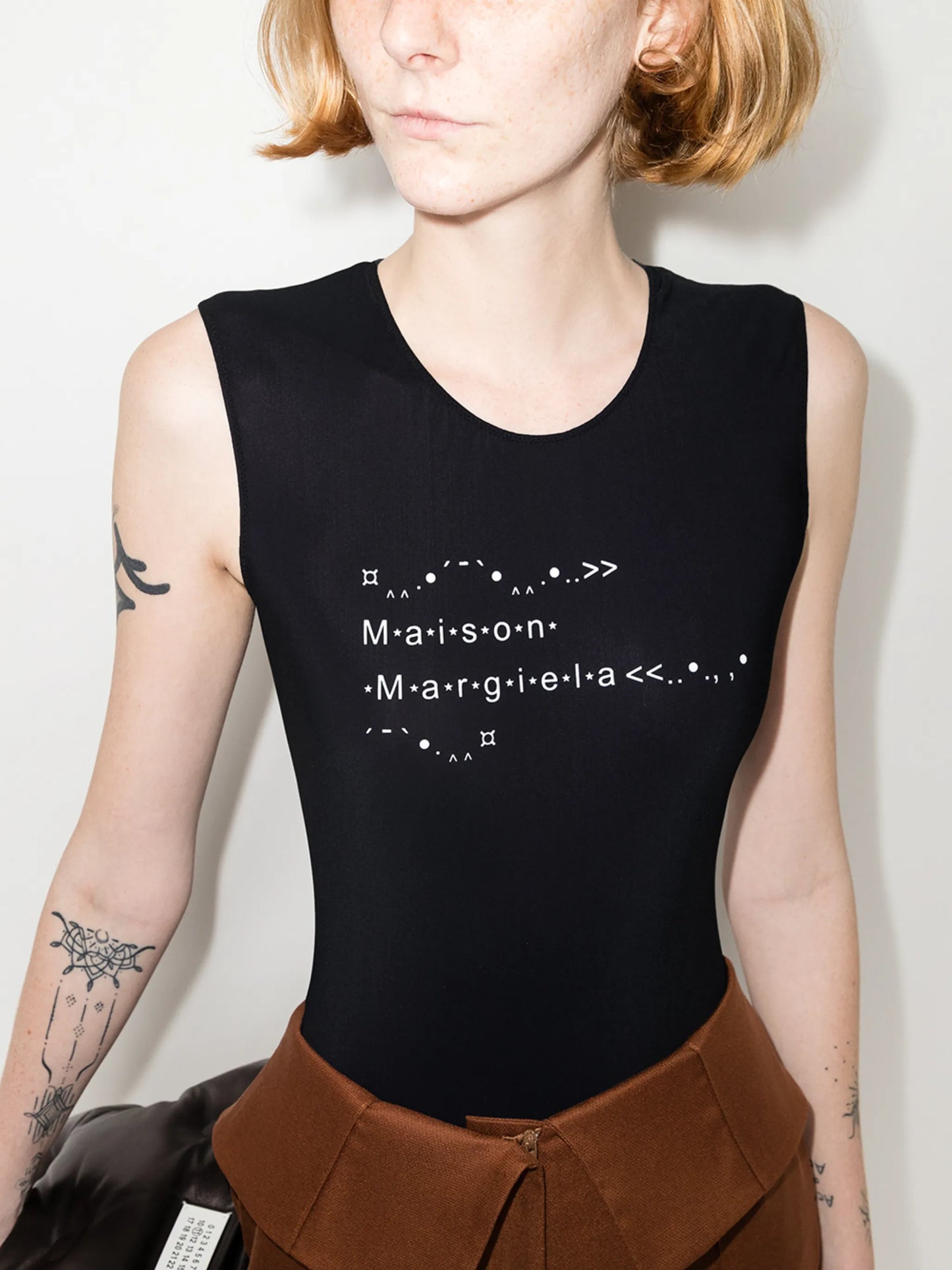four-stitch logo bodysuit