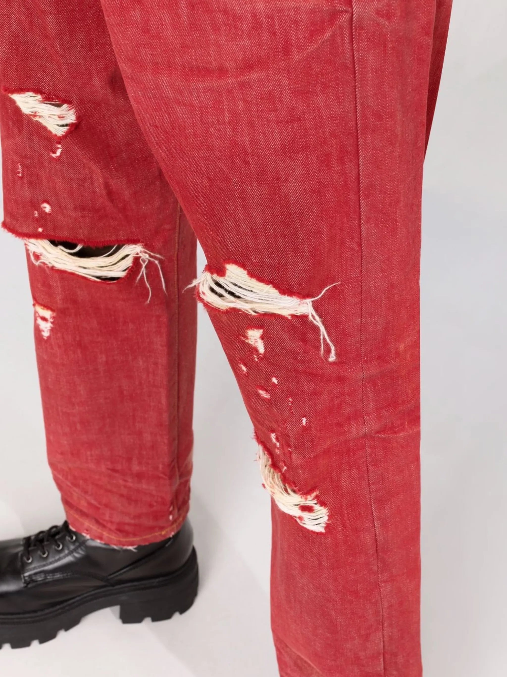 crossover asymmetric distressed jeans
