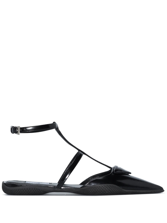 triangle-logo flat leather pumps