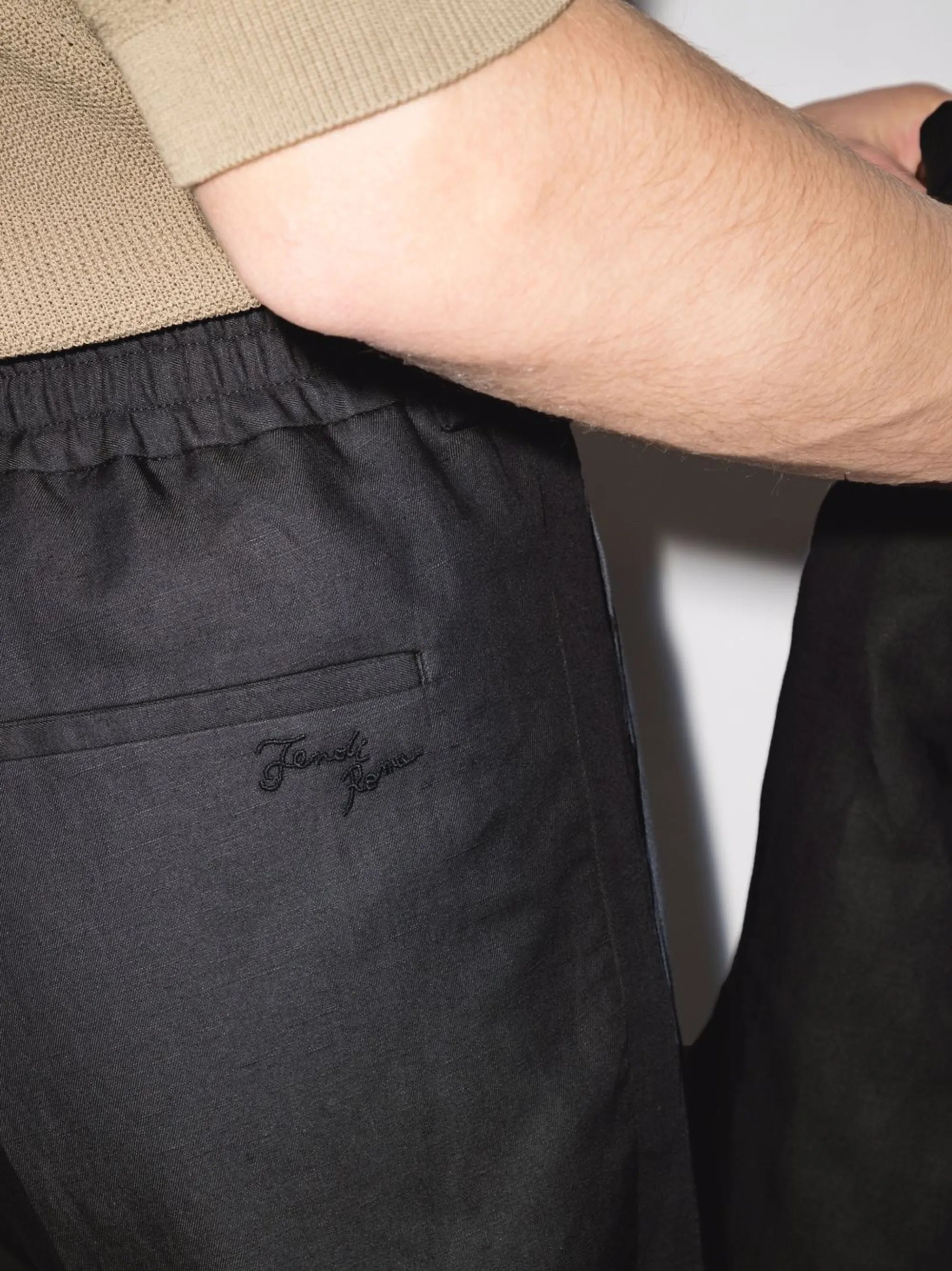 high-waisted tailored trousers