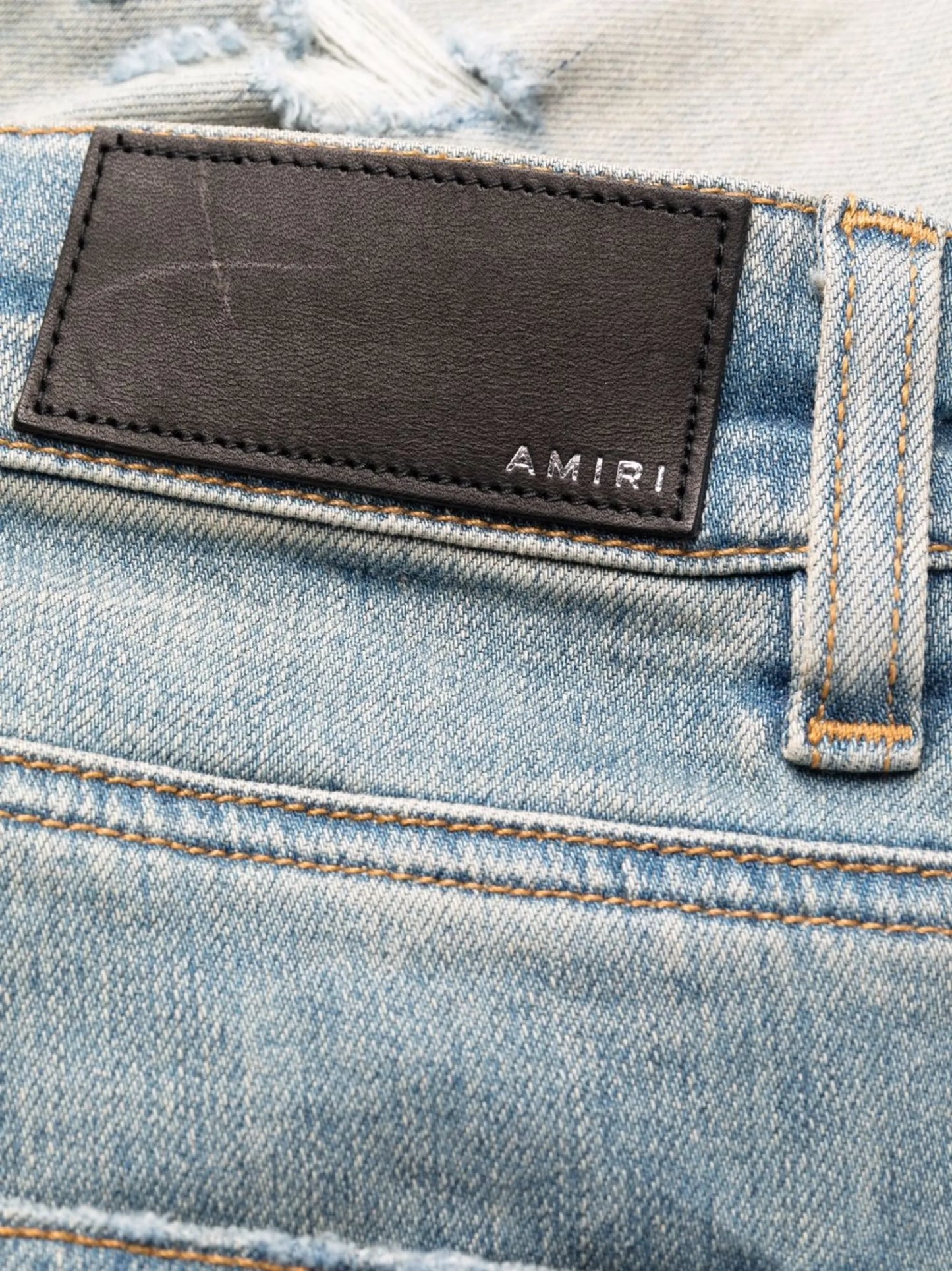 distressed skinny jeans
