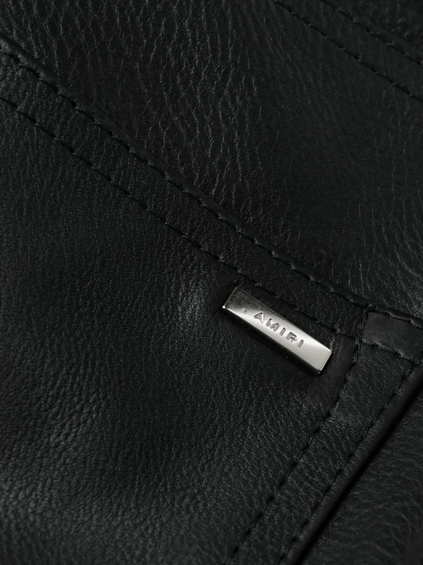 Combo bootleg leather-denim jeans