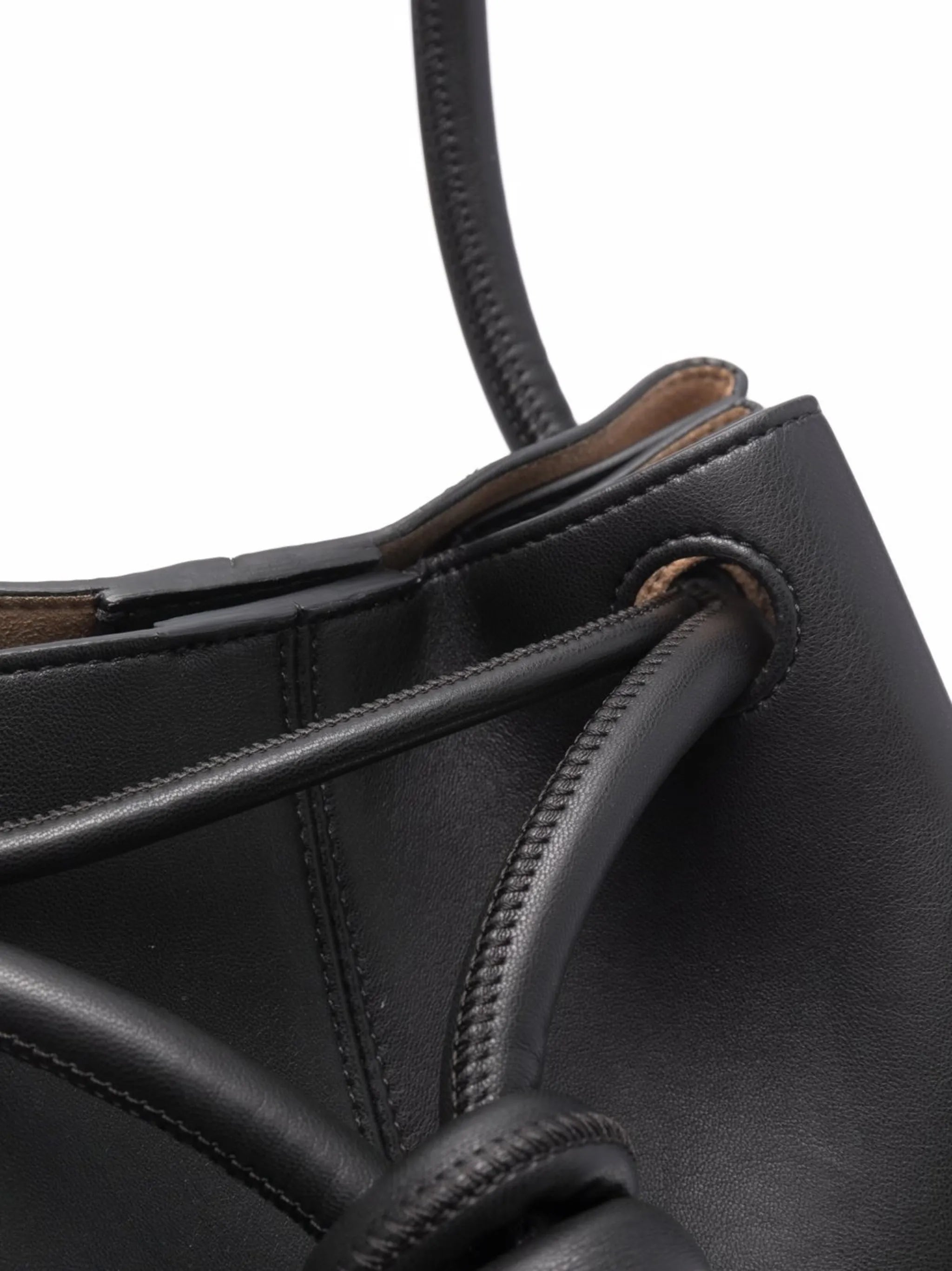 Elongated knot-detail bucket bag