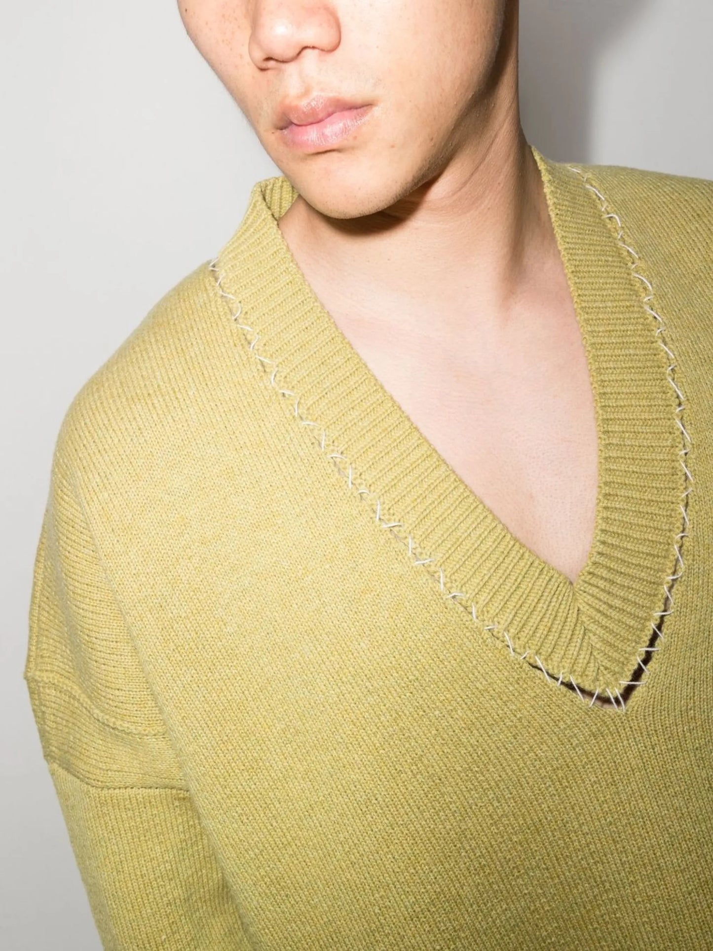 deconstructed V-neck jumper