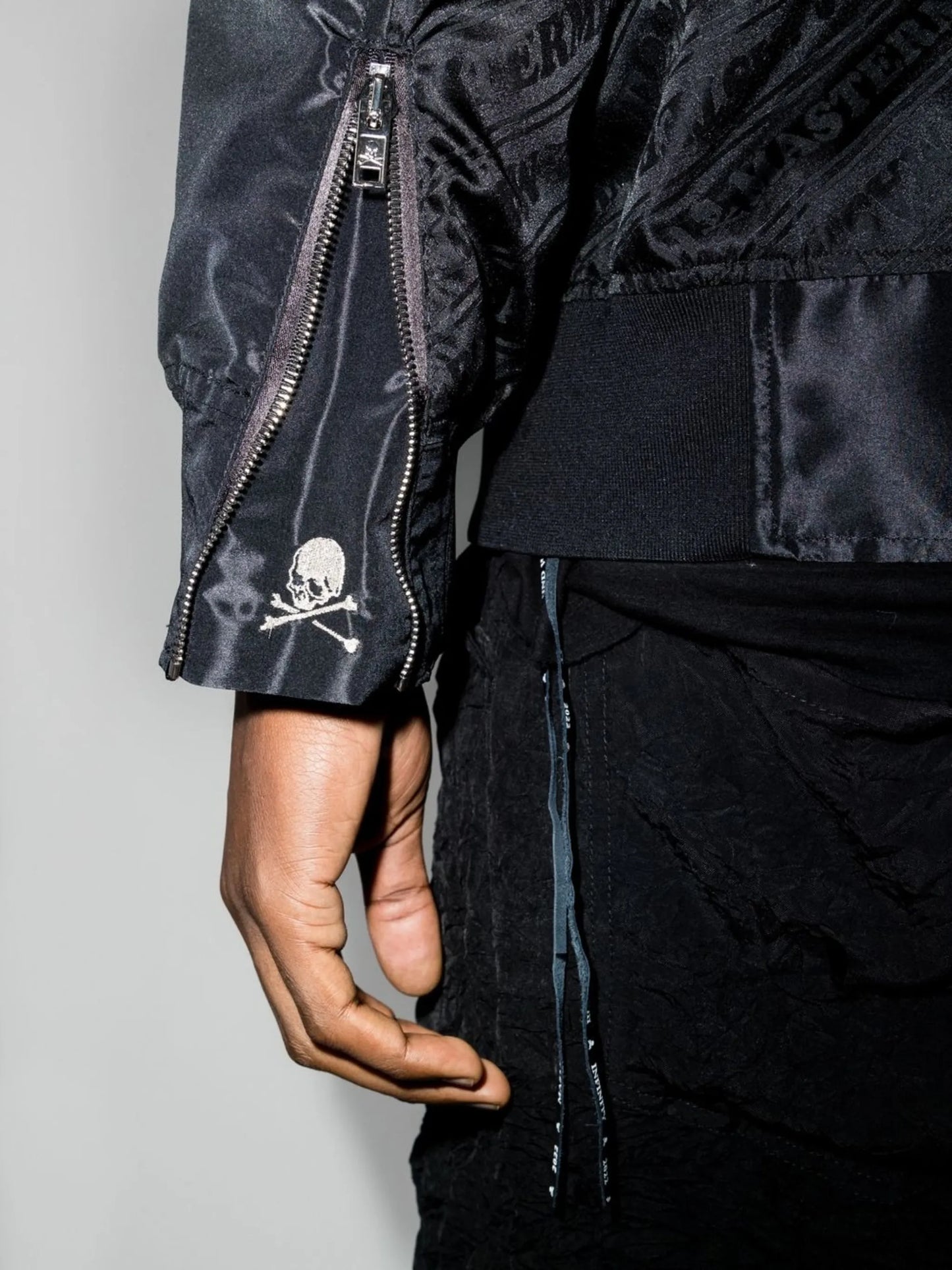 crystal skull-embellished bomber jacket