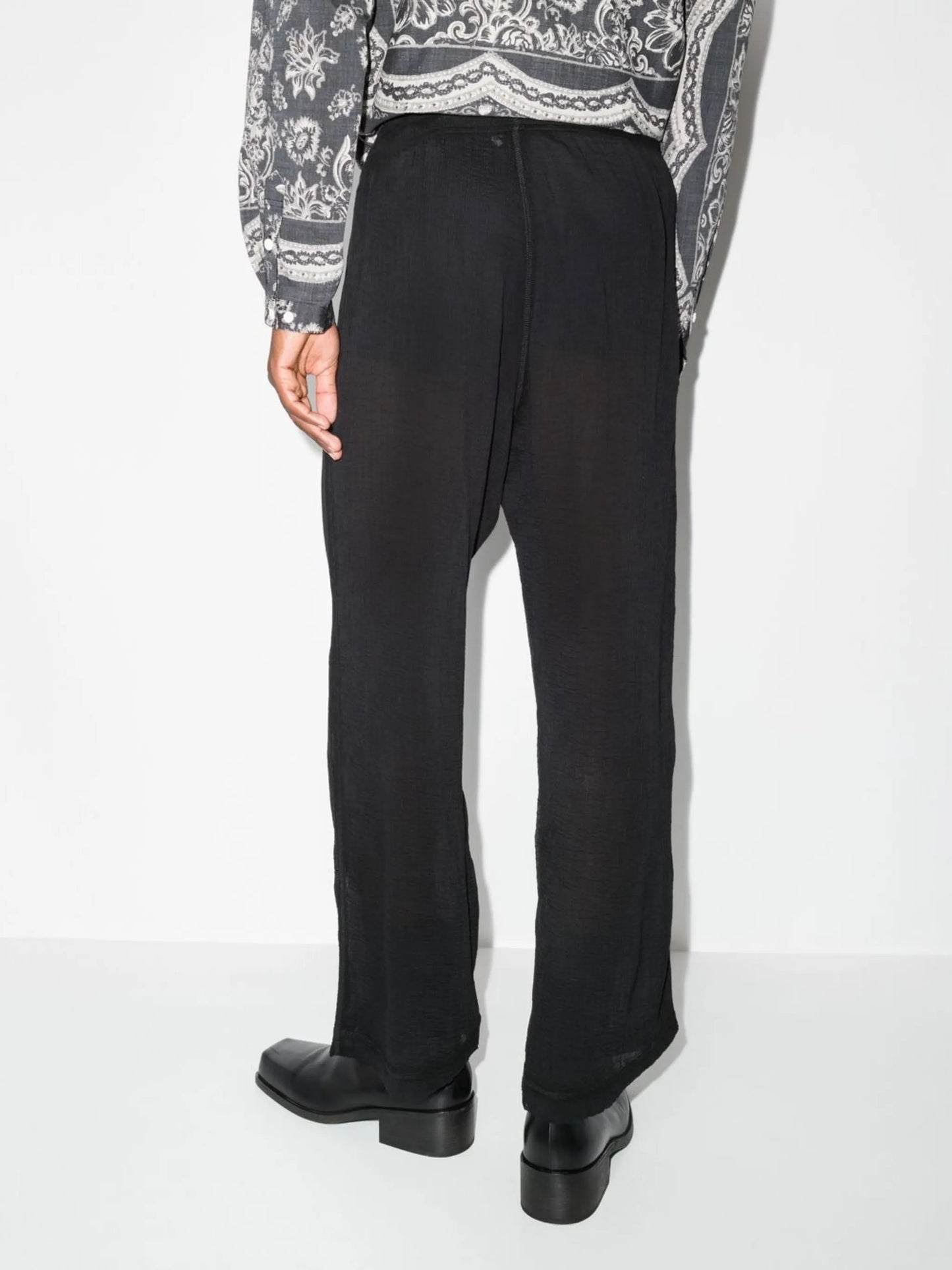 semi-sheer loose-fit trousers