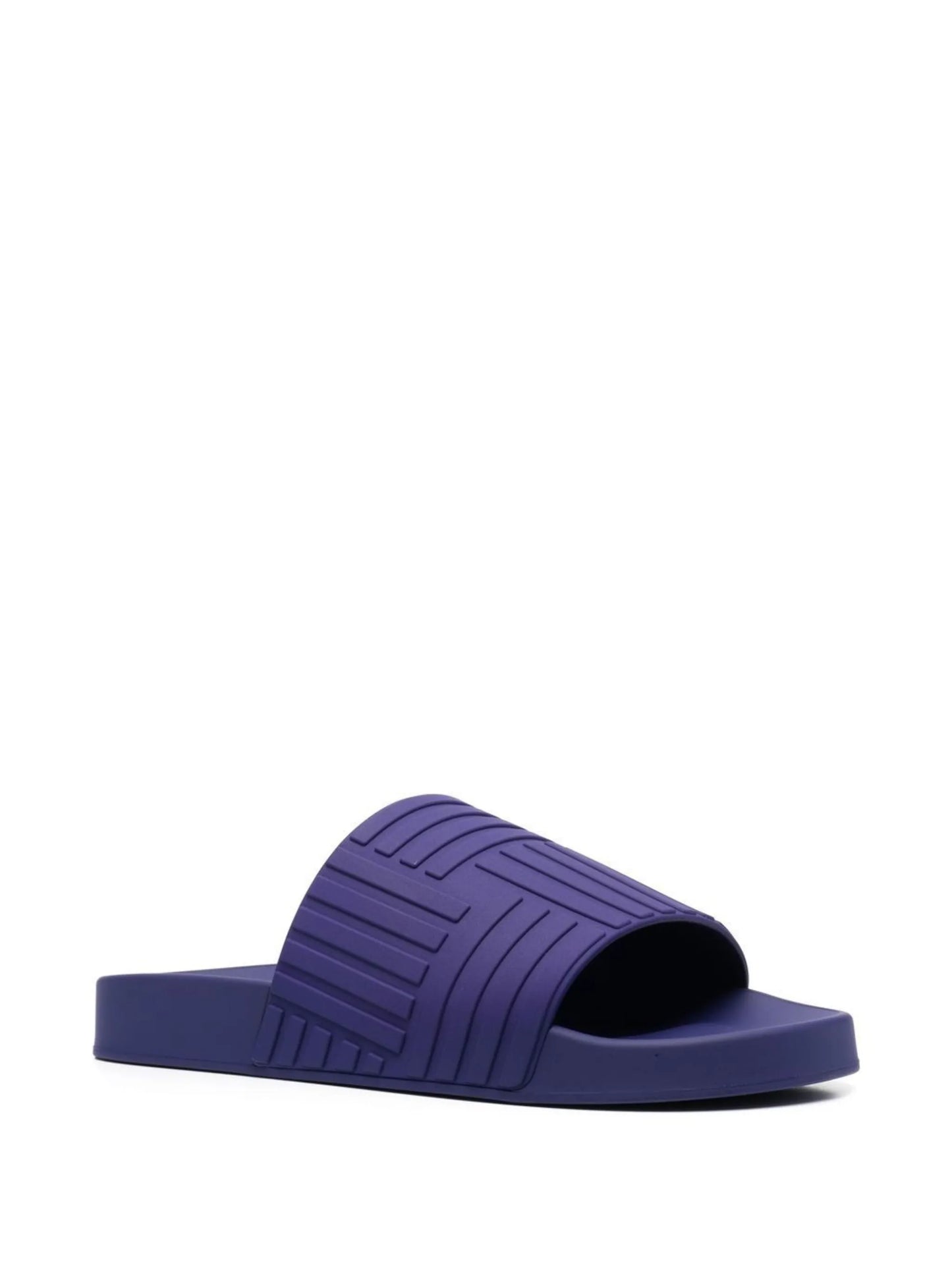 Intrecciato-embossed slides
