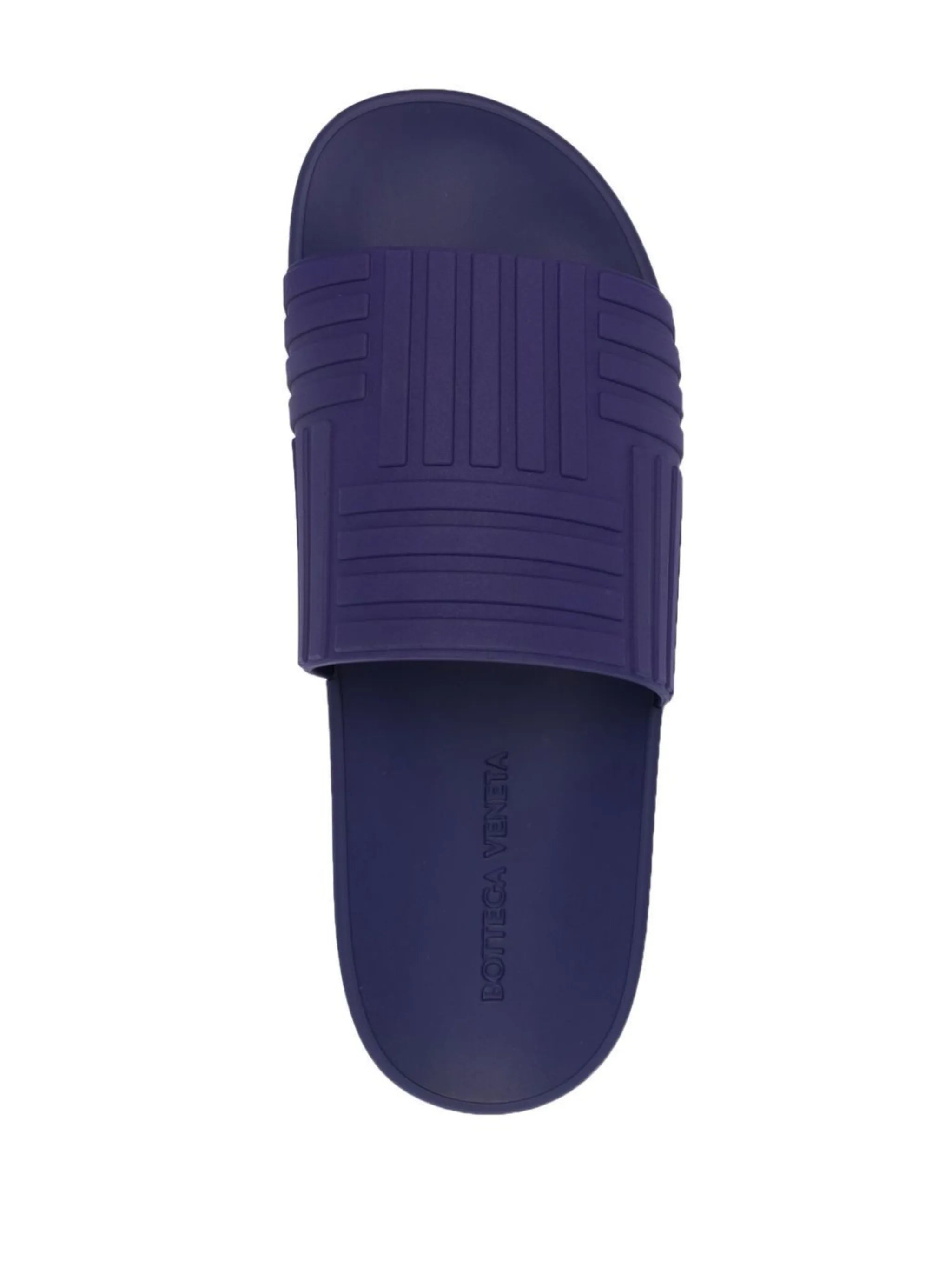 Intrecciato-embossed slides