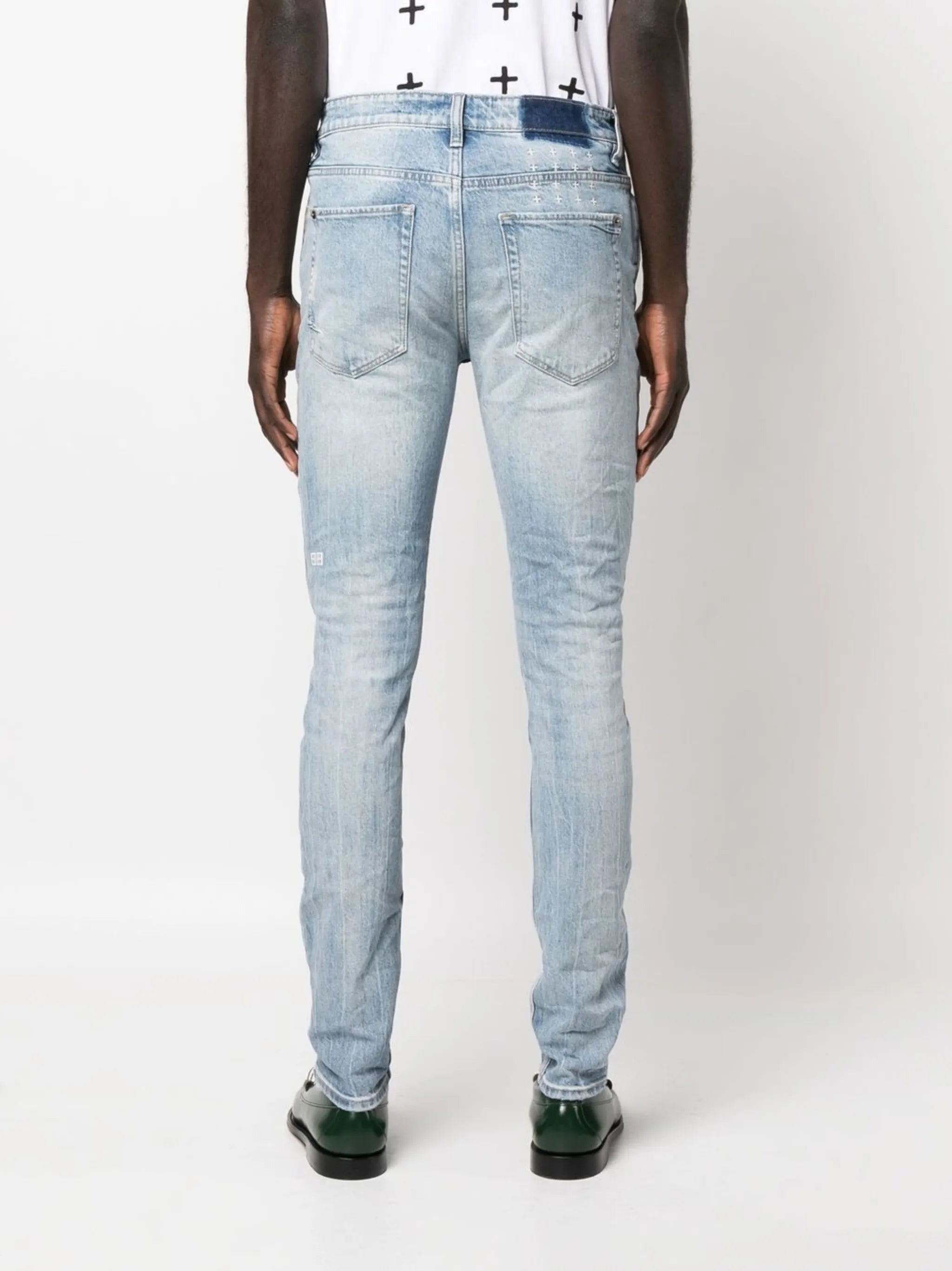 logo-print distressed skinny-cut jeans