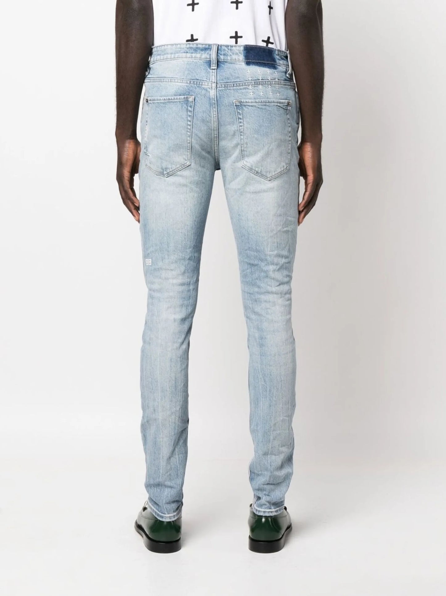 logo-print distressed skinny-cut jeans