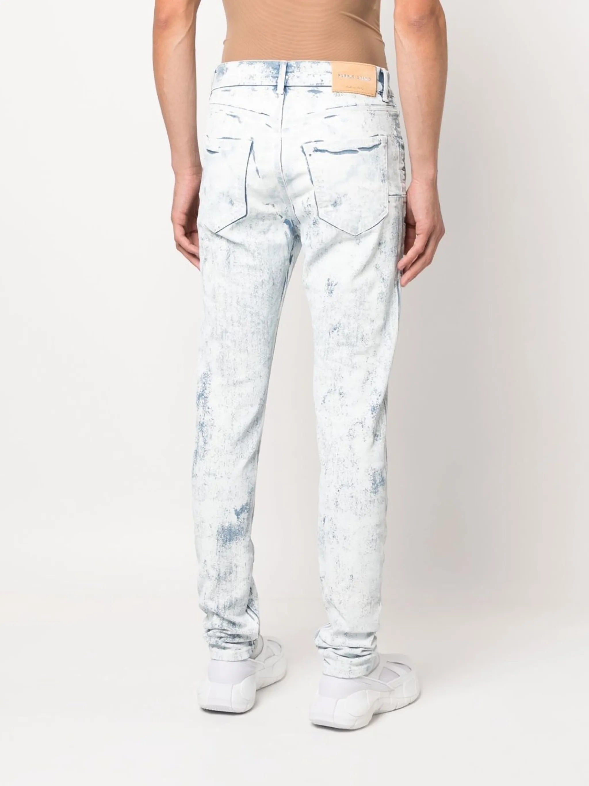Cracked White Over Light skinny jeans