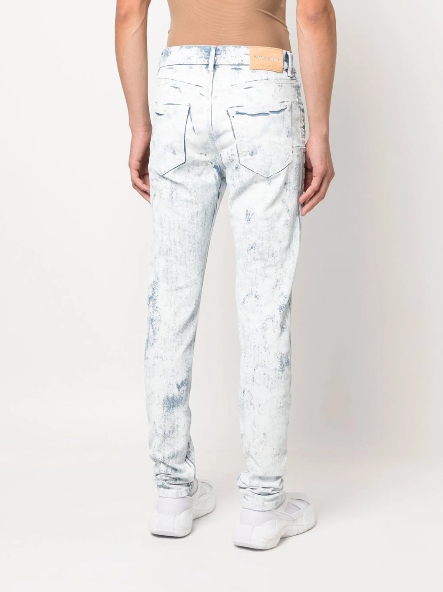 Cracked White Over Light skinny jeans