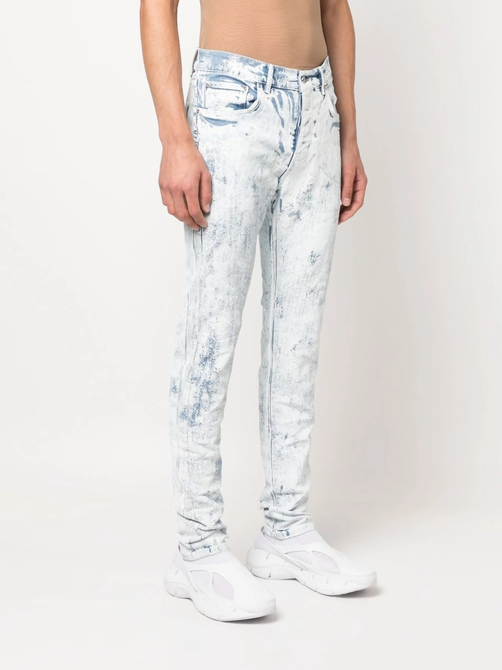Cracked White Over Light skinny jeans
