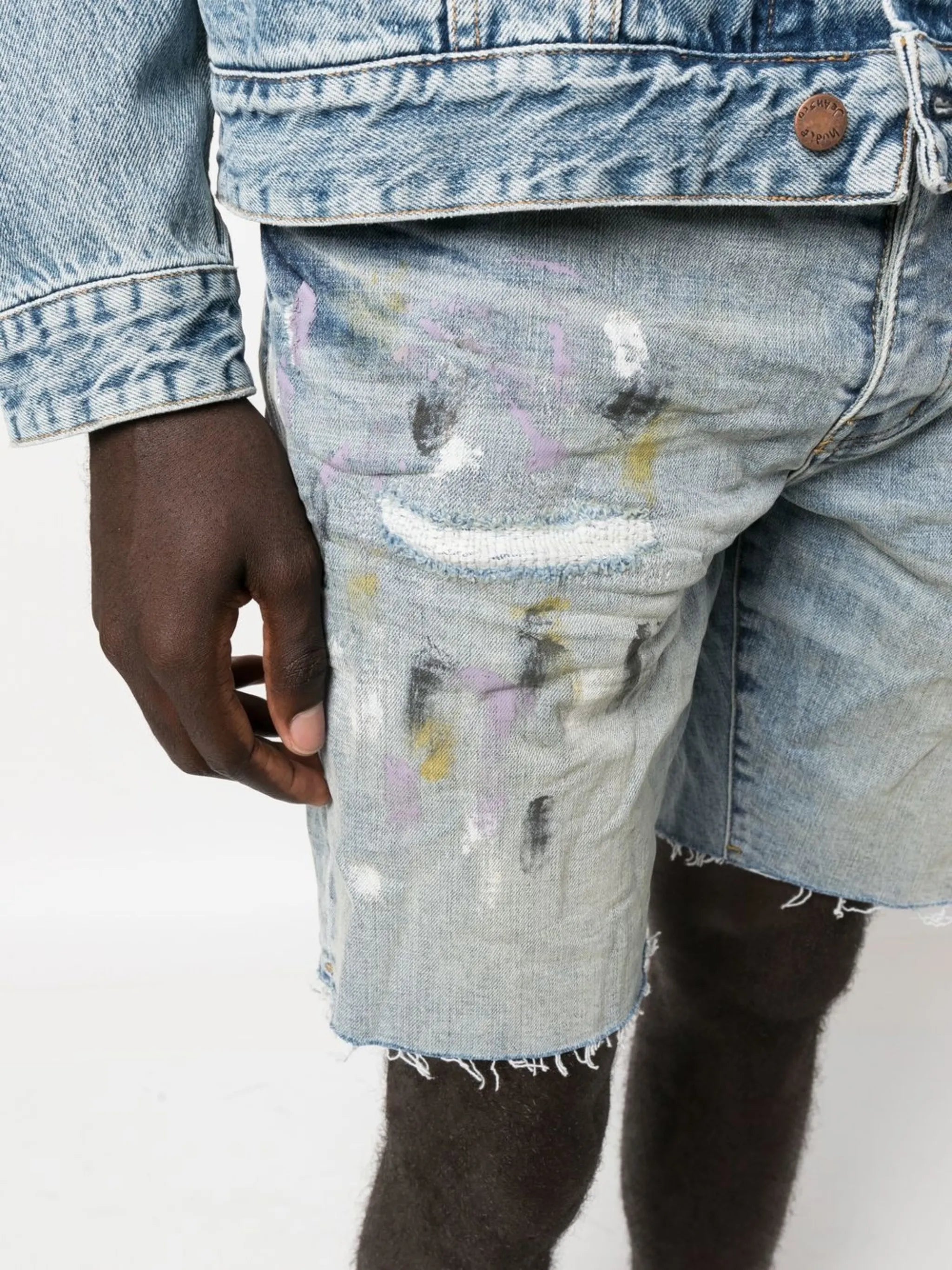 paint-splatter denim shorts