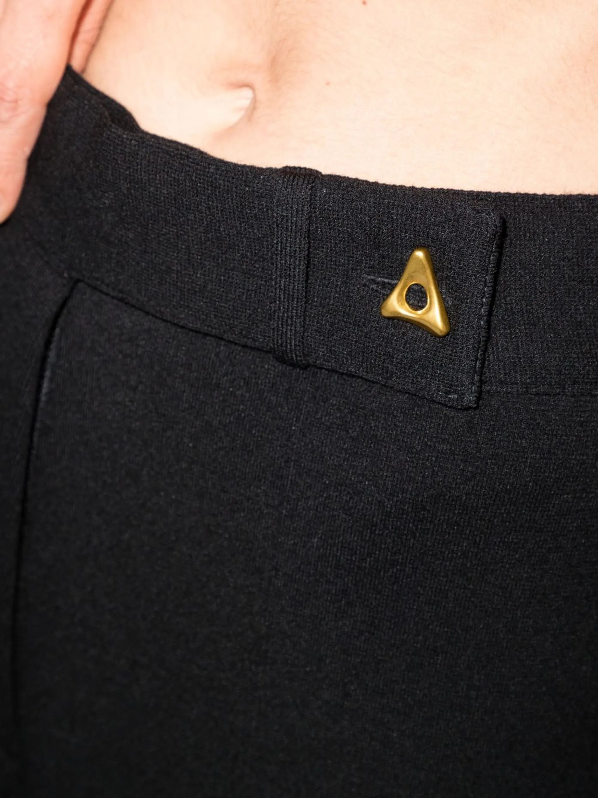 Madeleine logo-plaque knitted trousers