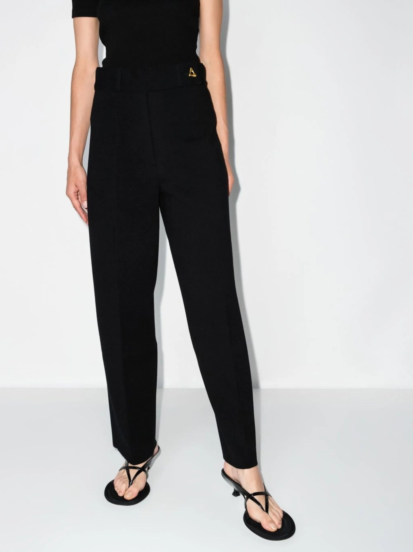 Madeleine logo-plaque knitted trousers