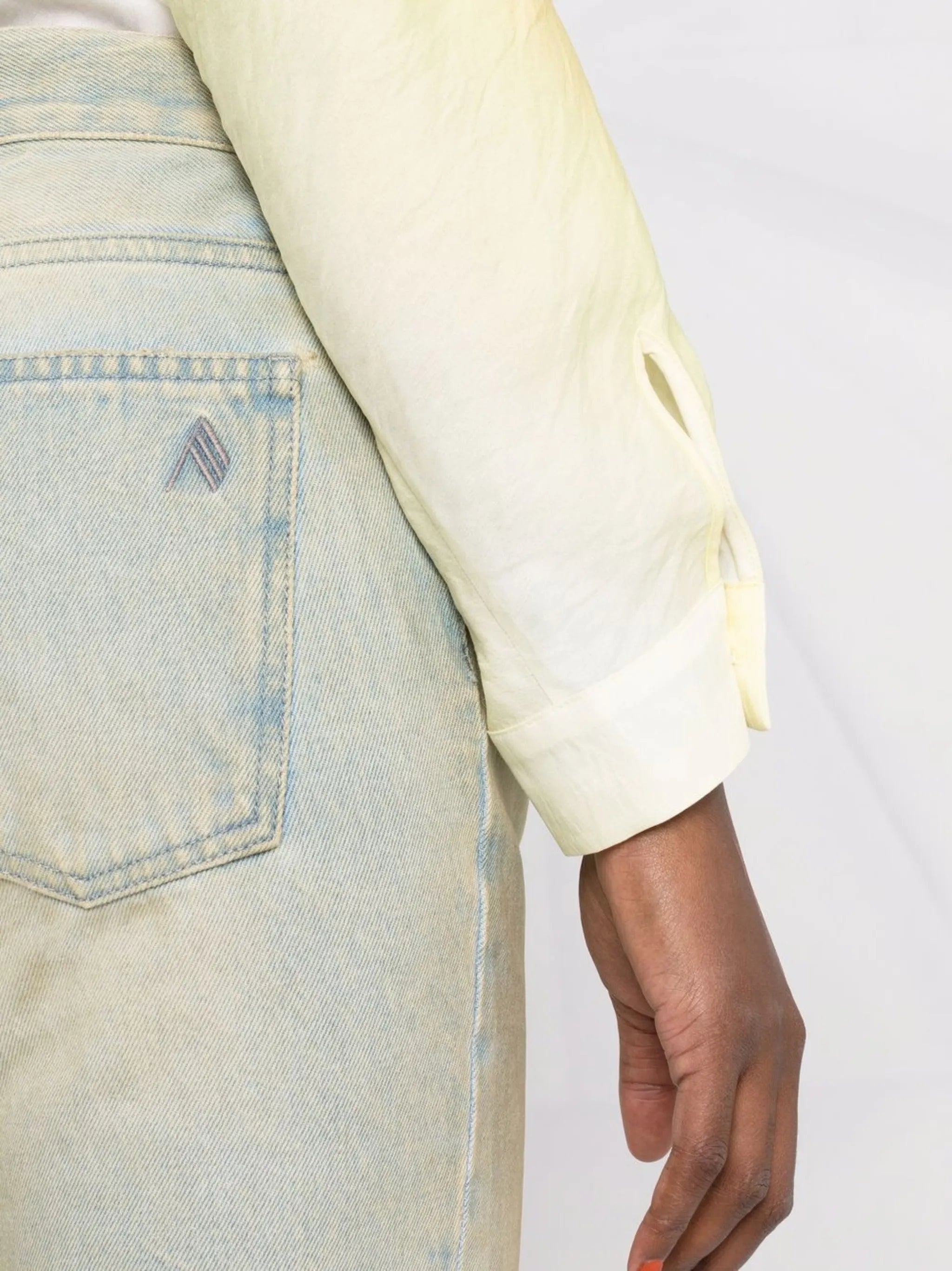 distressed-finish flared-leg denim jeans