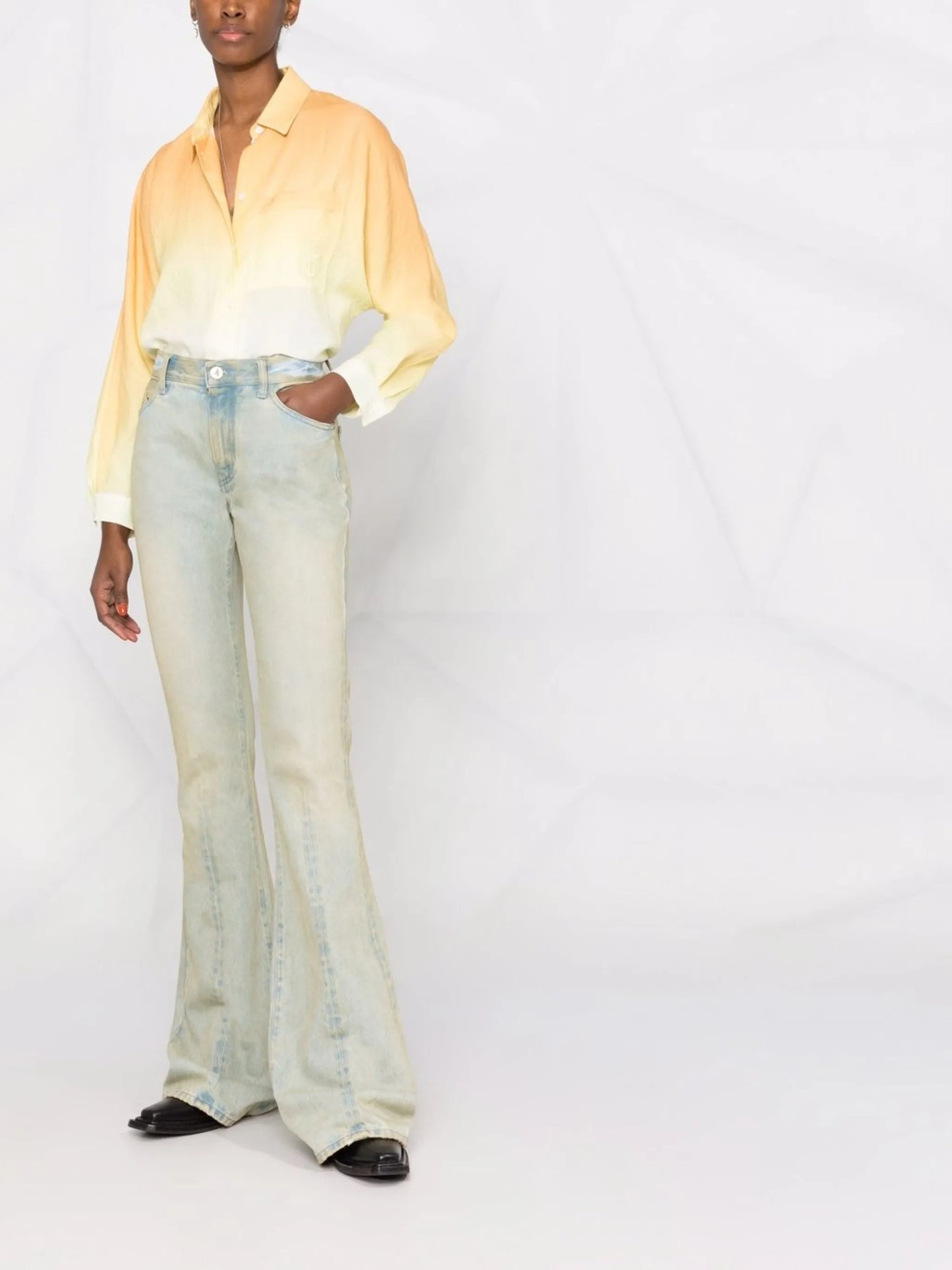 distressed-finish flared-leg denim jeans