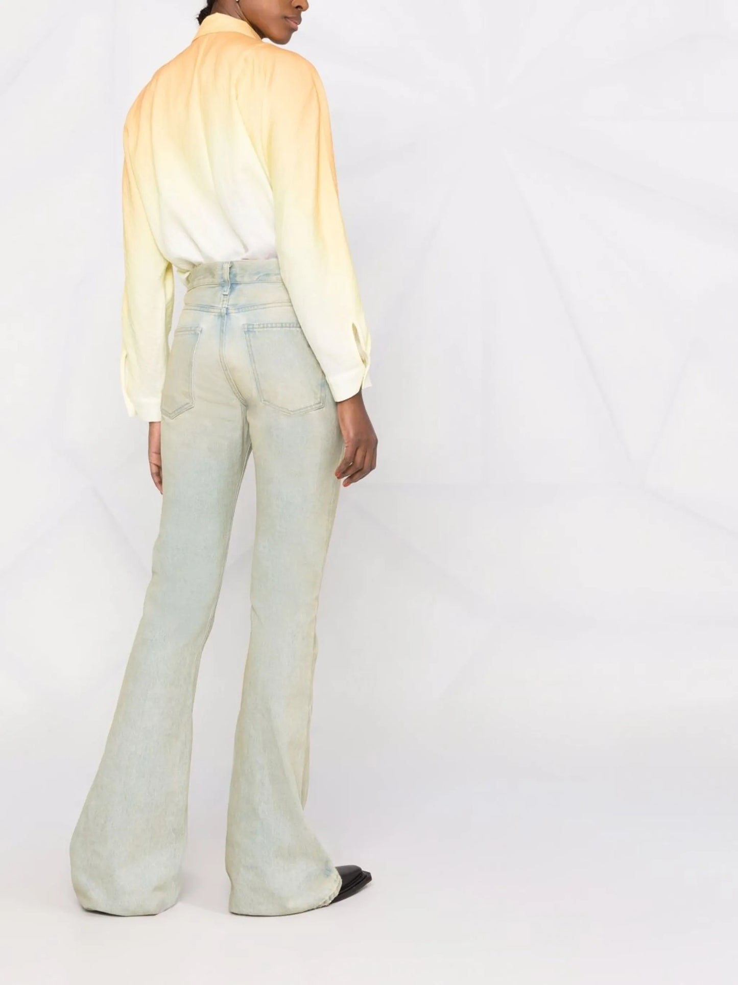 distressed-finish flared-leg denim jeans