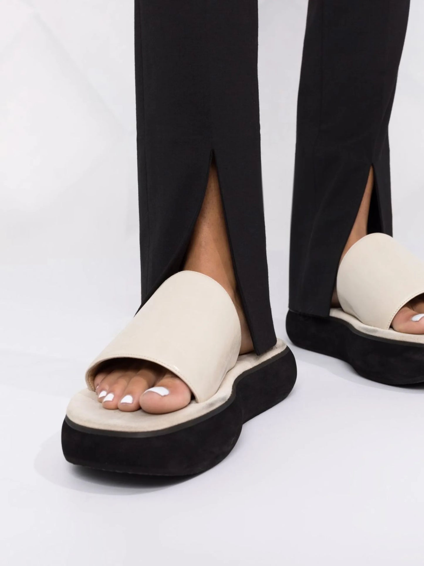 tailored split-cuff slim-fit trousers