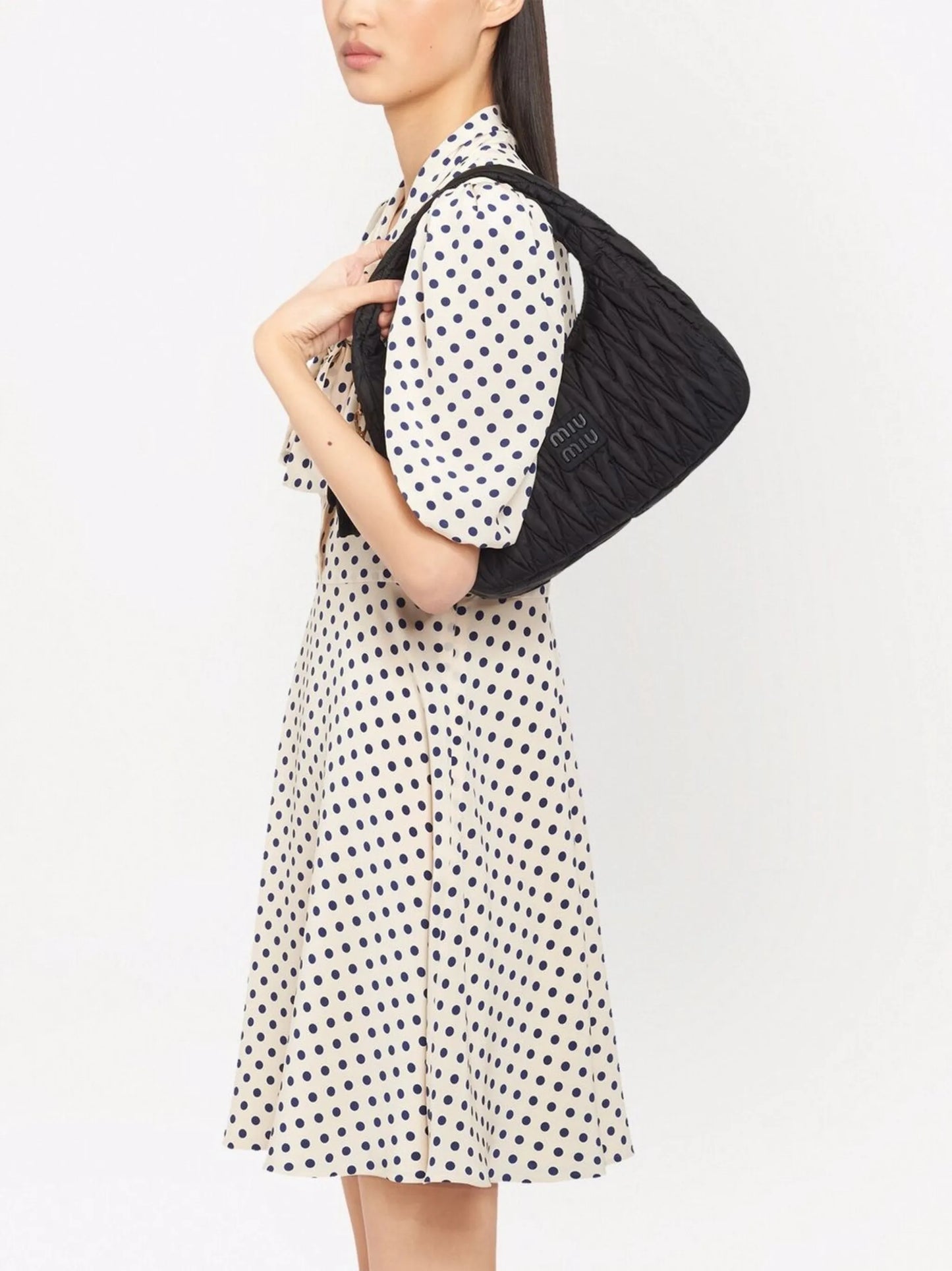 Wander matelassé shoulder bag