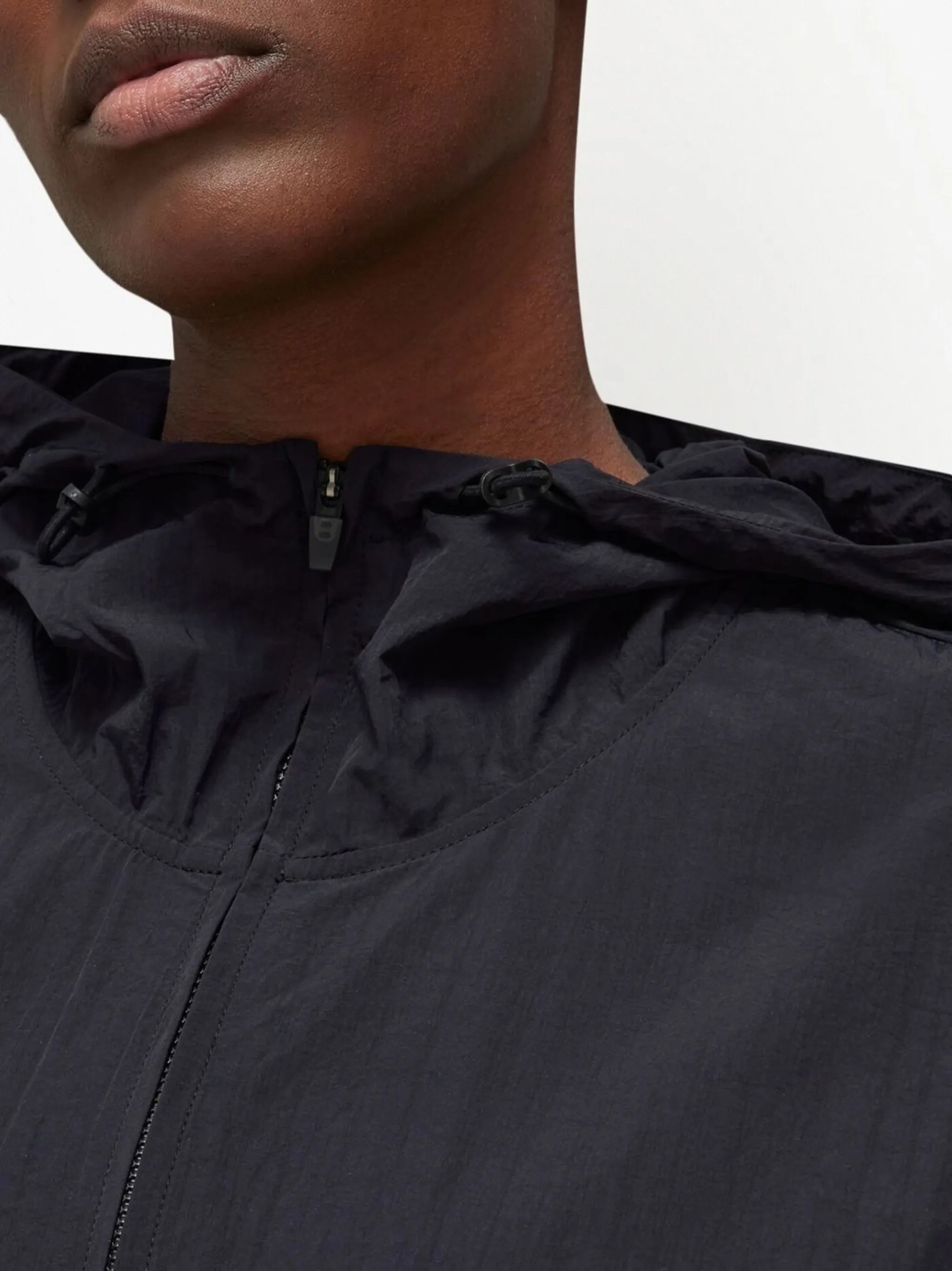 zipped hooded windbreaker