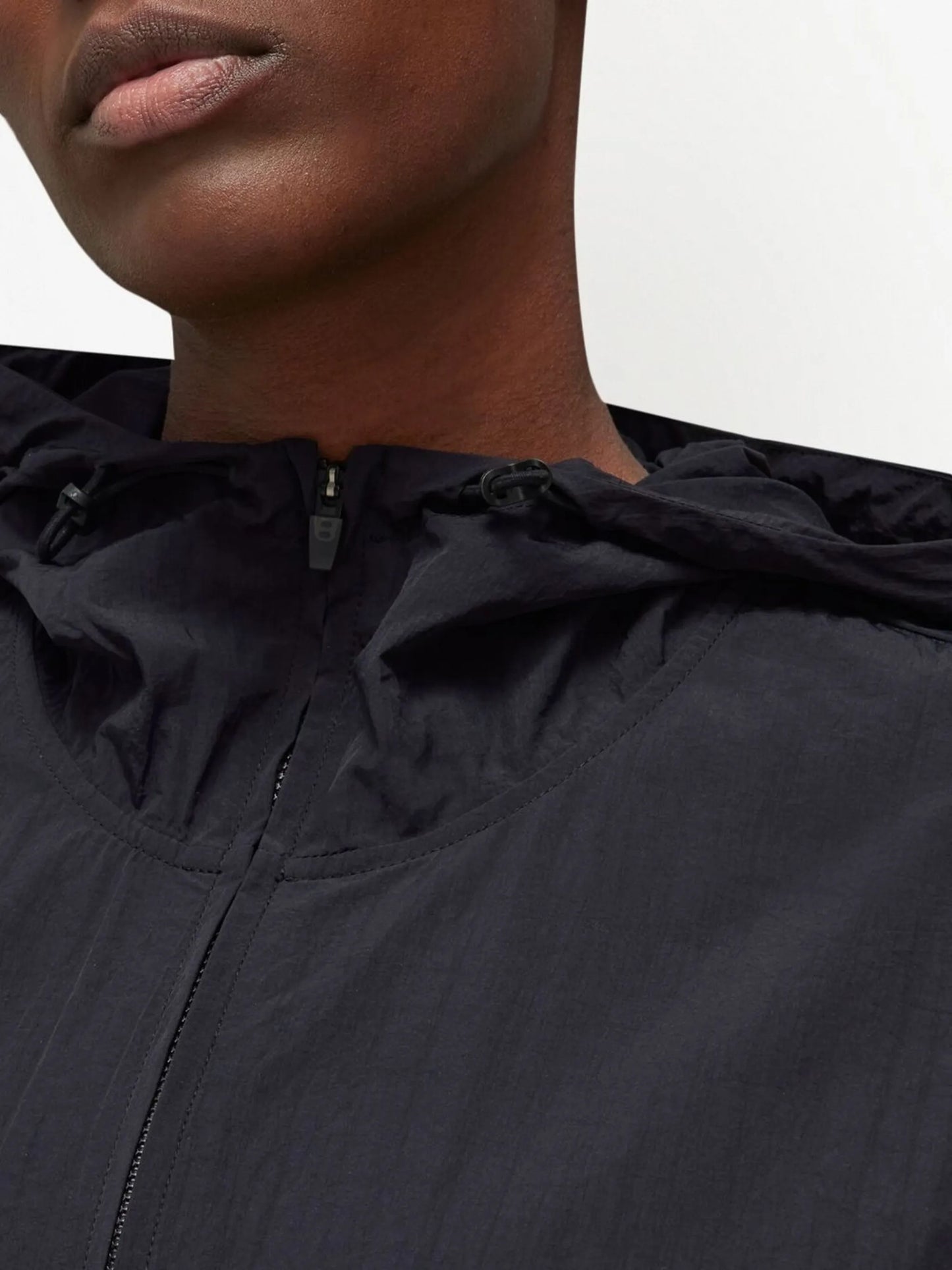 zipped hooded windbreaker