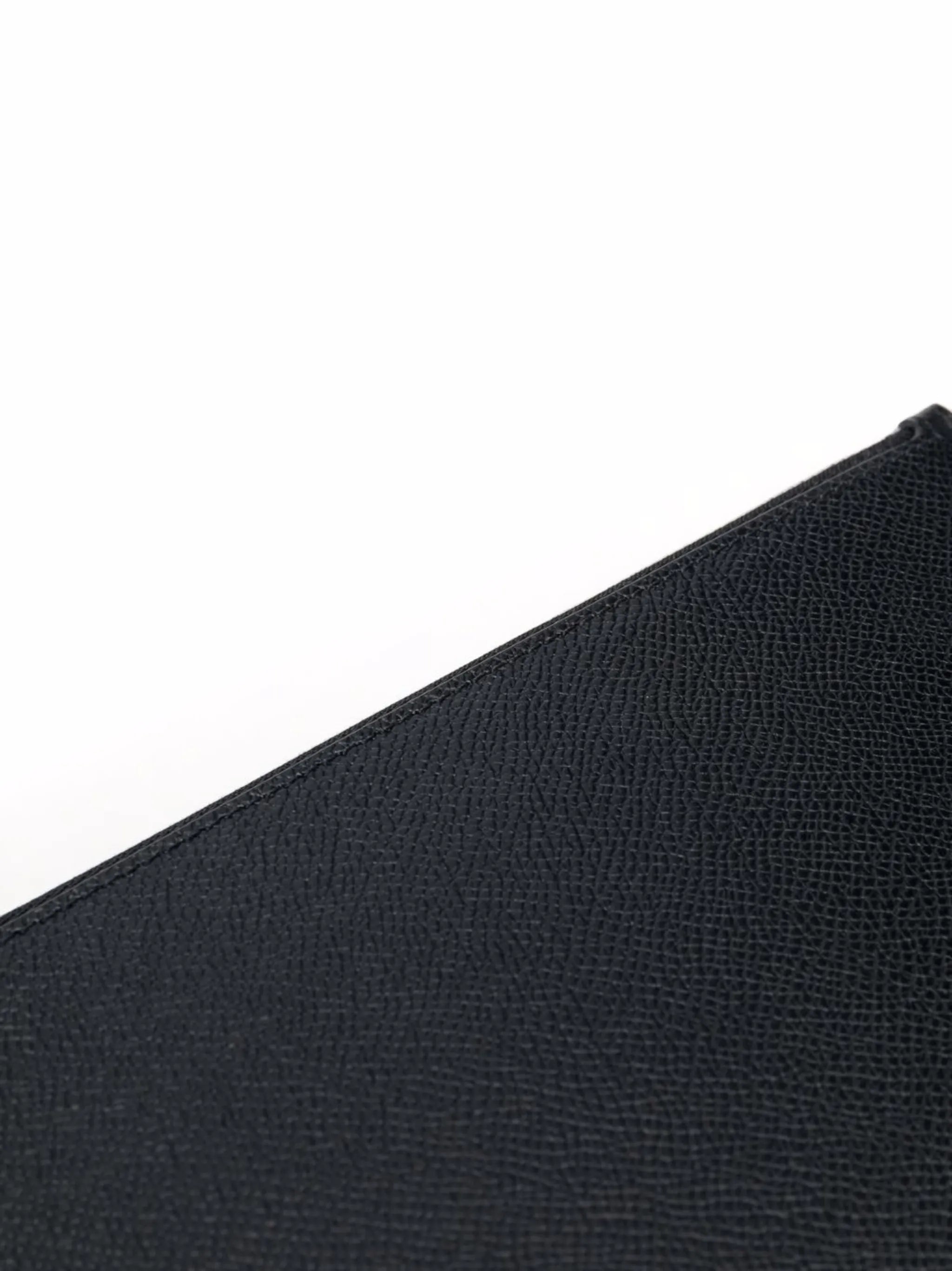 four-stitch clutch