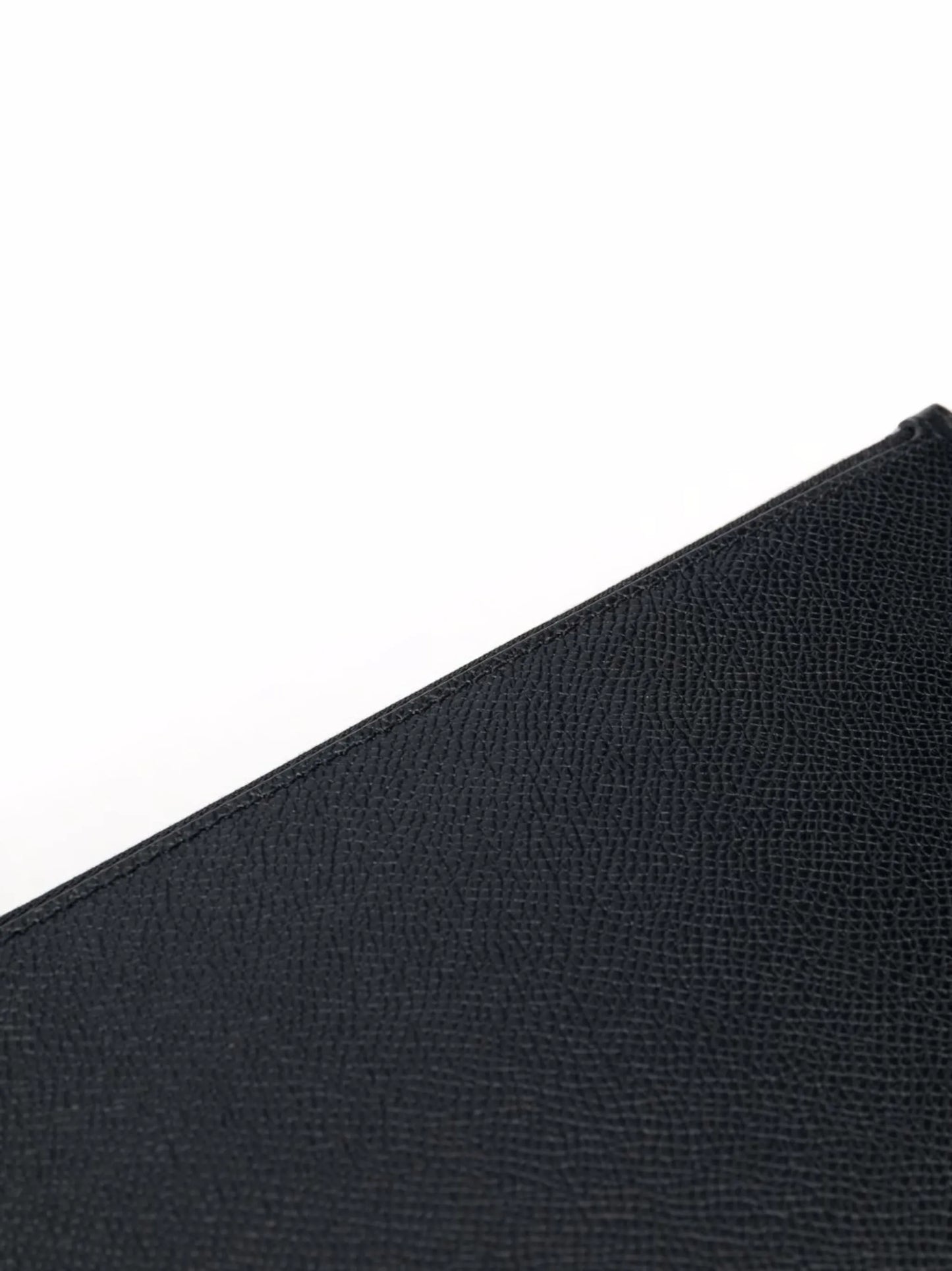four-stitch clutch
