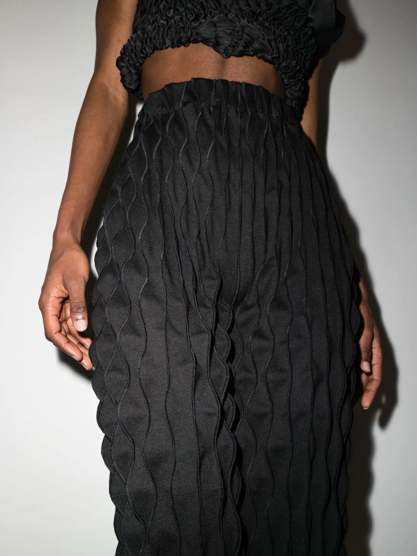 high-waisted textured-finish trousers