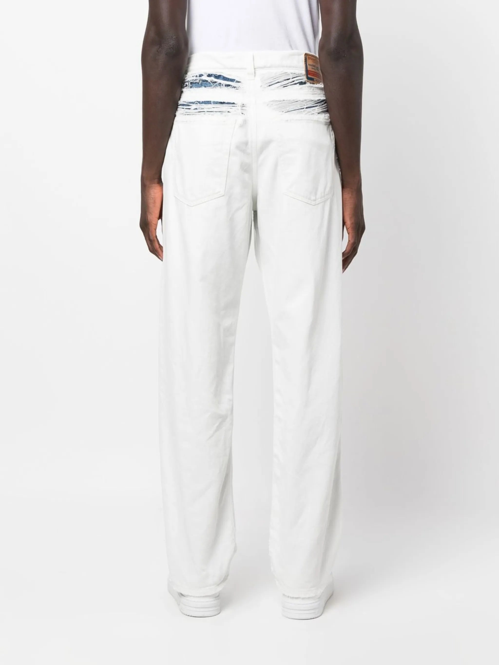 ripped layered straight-leg jeans