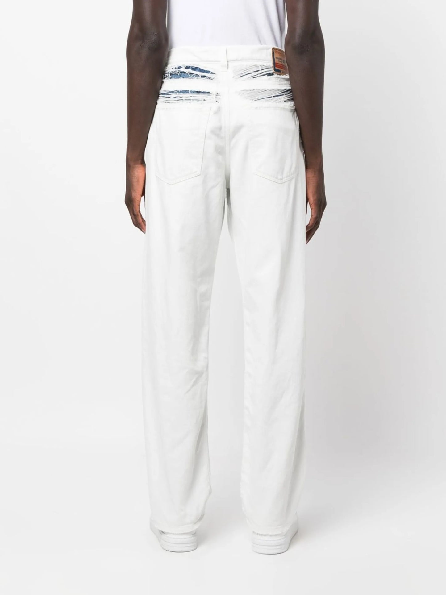 ripped layered straight-leg jeans