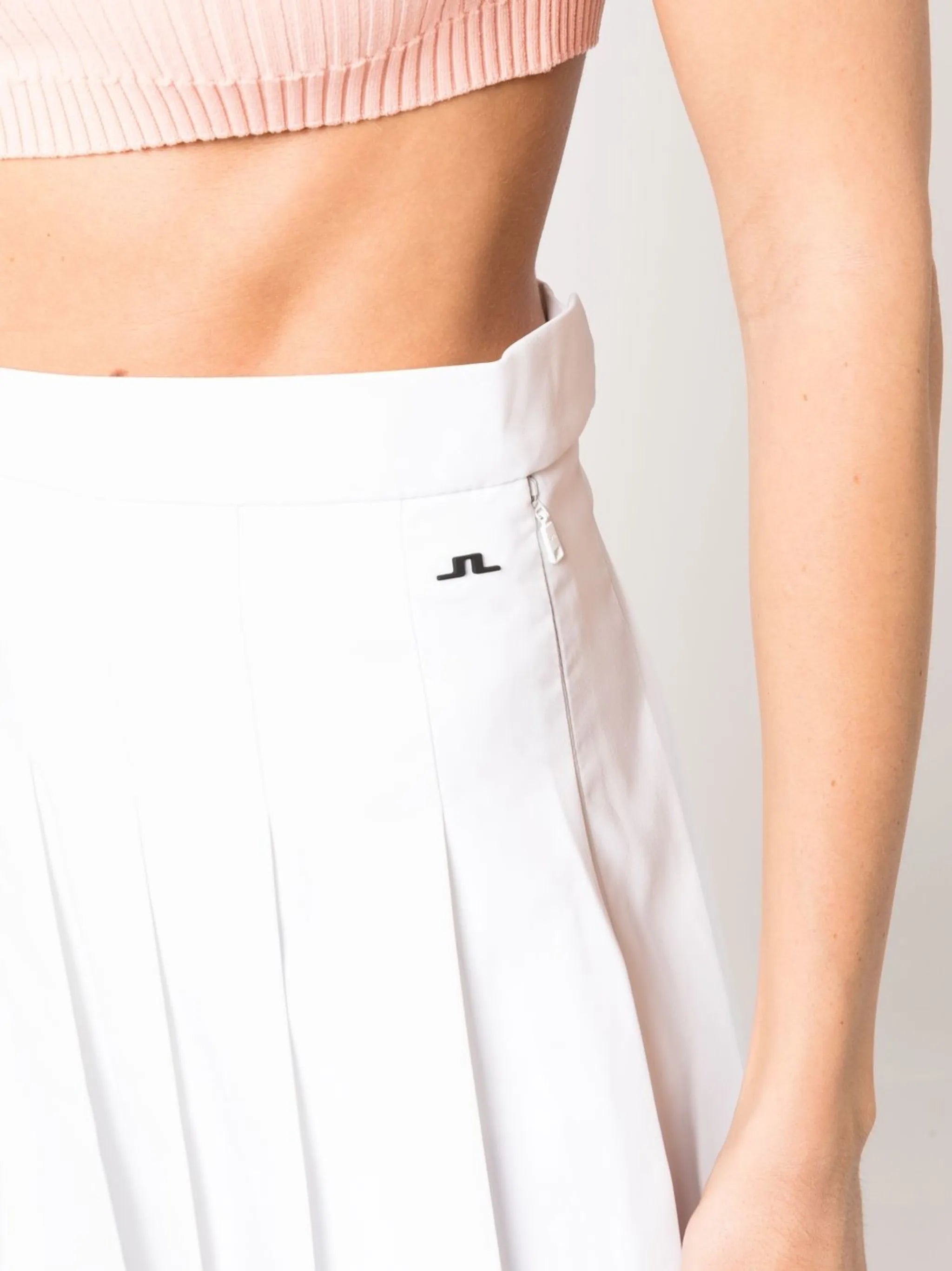 high-waisted pleated skirt