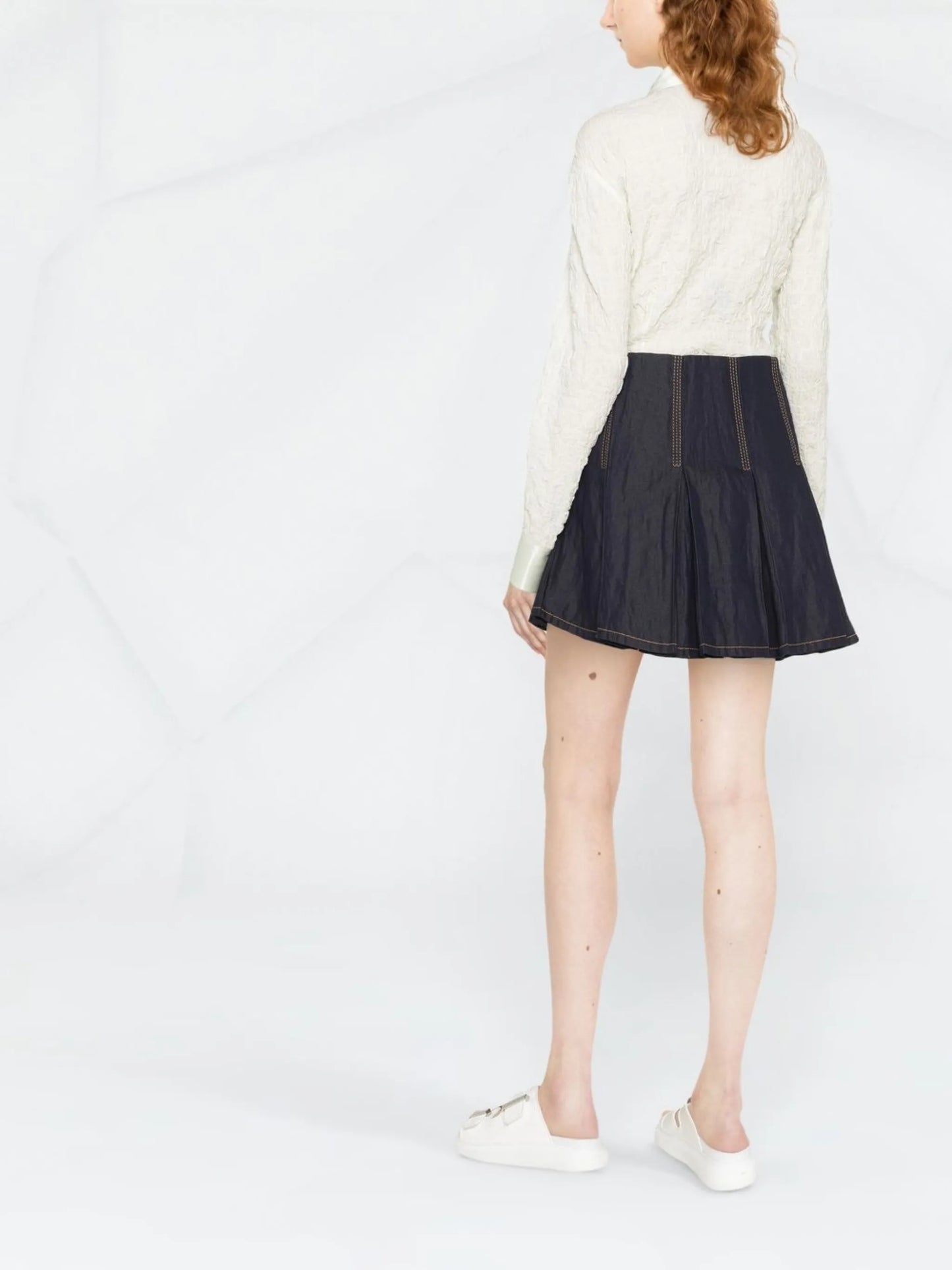 pleated denim mini skirt