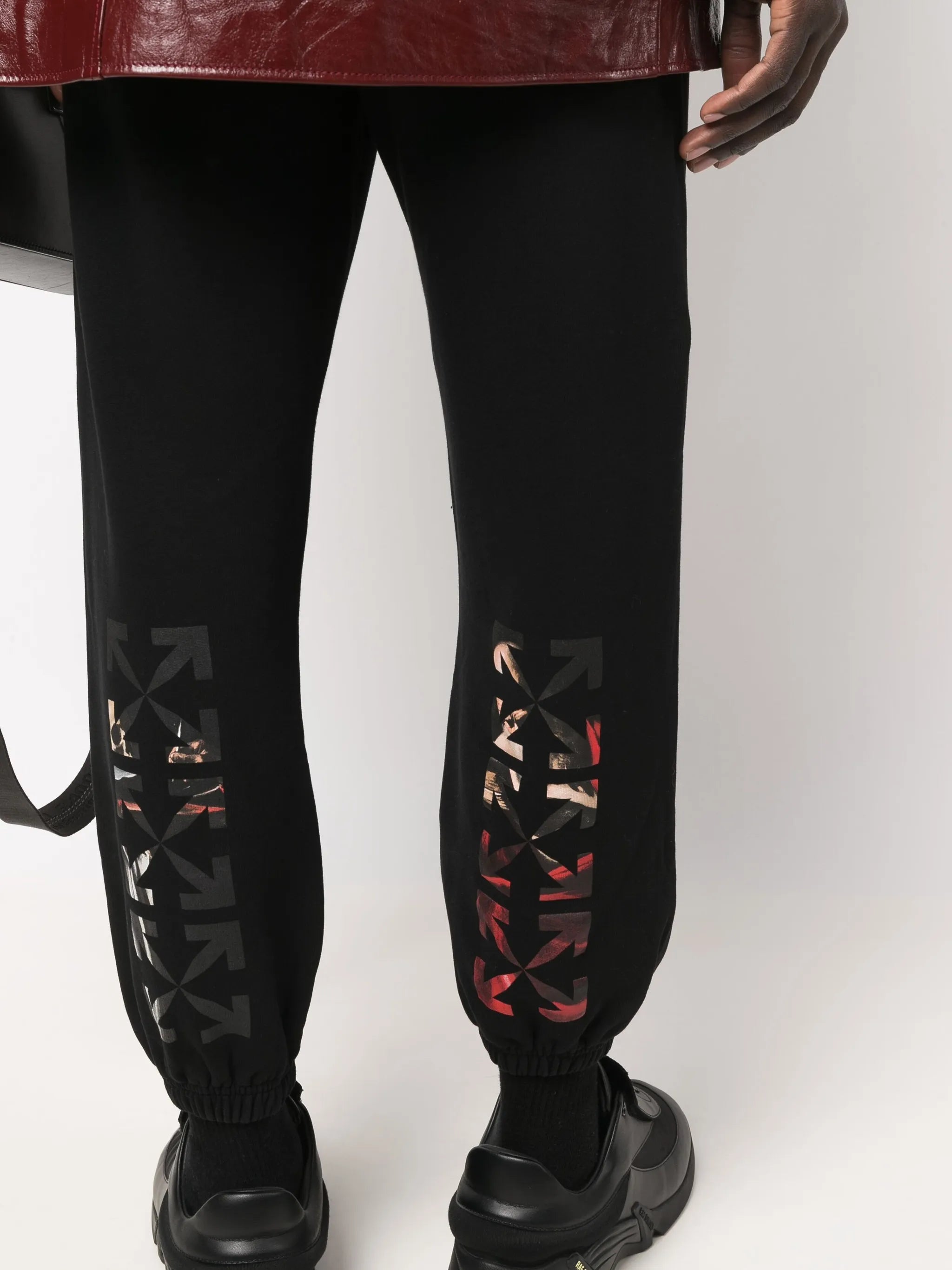 Caravaggio Arrows-print track pants